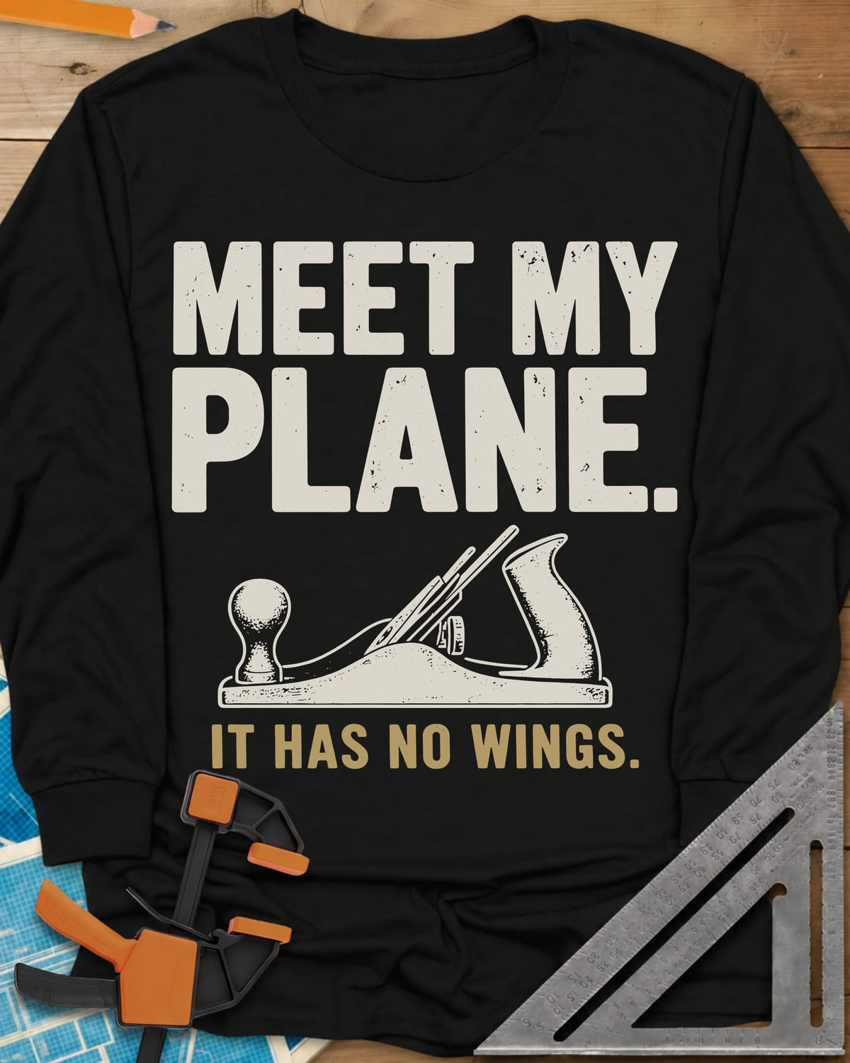 Meet My Plane long sleeve shirt in Black, a cream bench hand plane under worn block lettering and a tan tagline