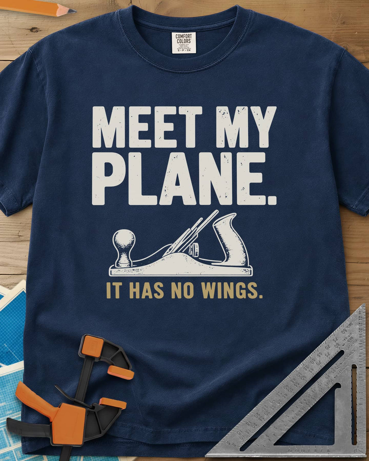 Meet My Plane heavyweight tee in Navy, a cream bench hand plane under worn block lettering and a tan tagline