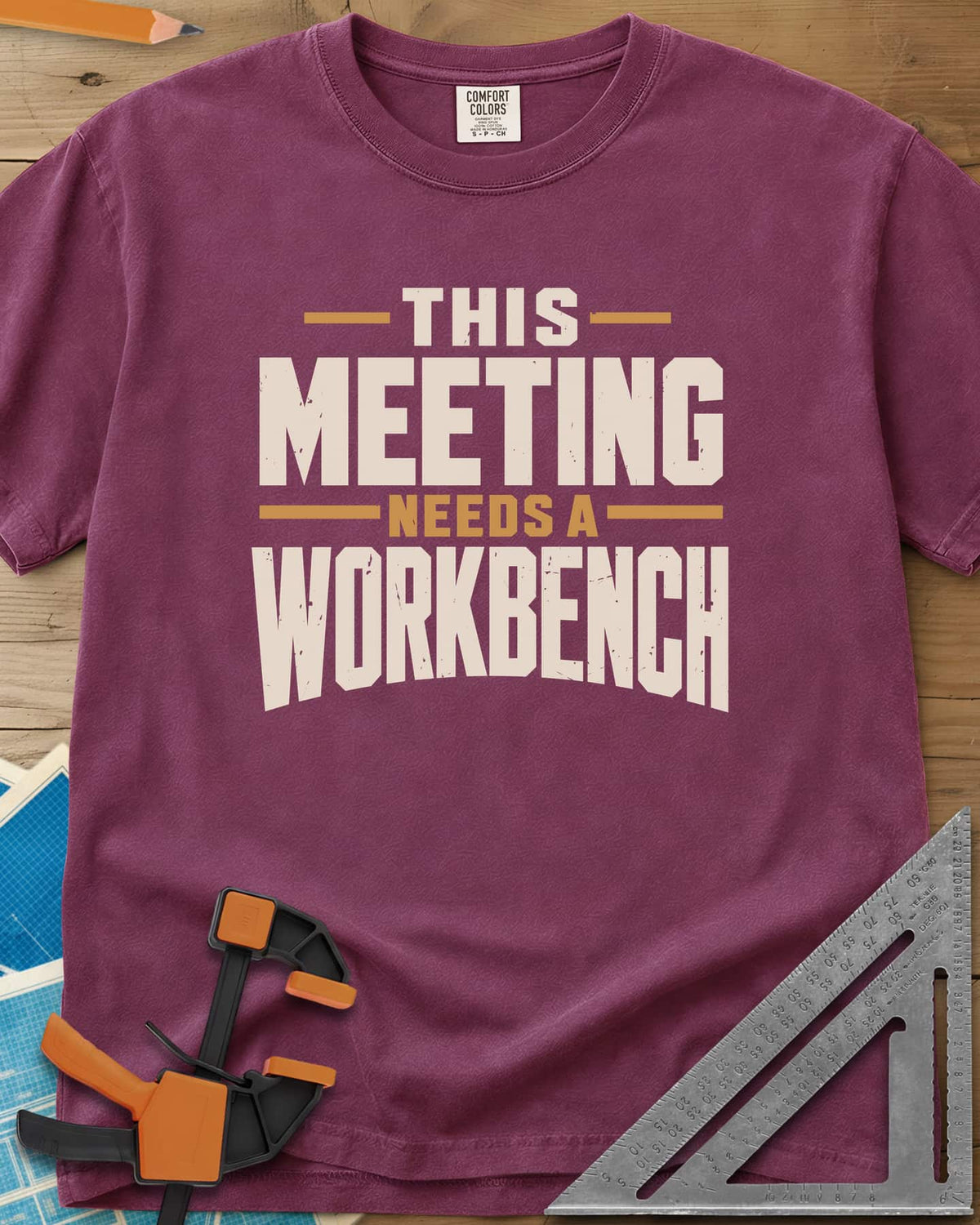 Meeting Workbench heavyweight tee in Berry, distressed block capitals in cream and gold, no graphic