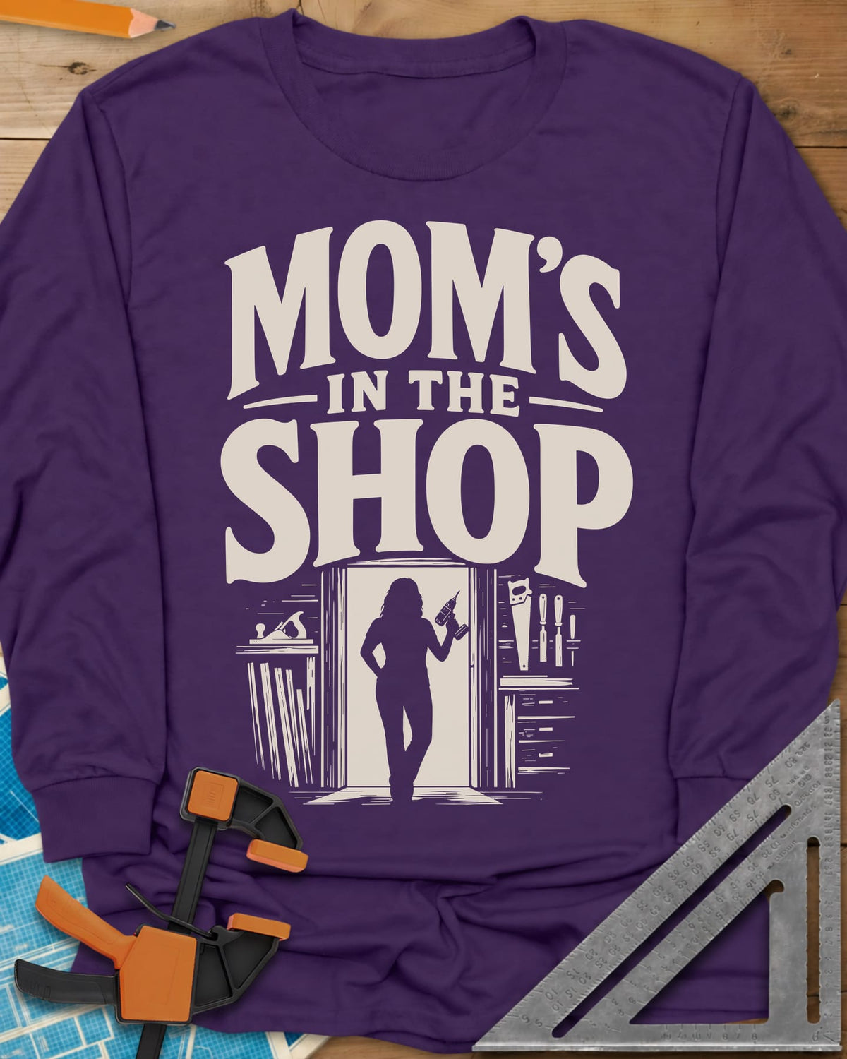 Mom'S Shop long sleeve shirt in Purple, silhouette of a woman with a cordless drill in a shop doorway