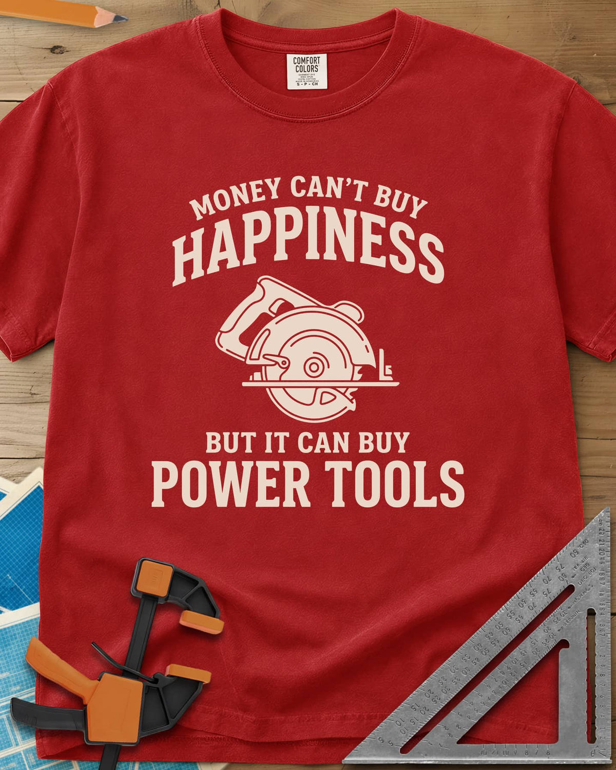 Money Can't Buy Happiness Power Tools heavyweight tee in Red, line-drawn circular saw between two lines of curved lettering