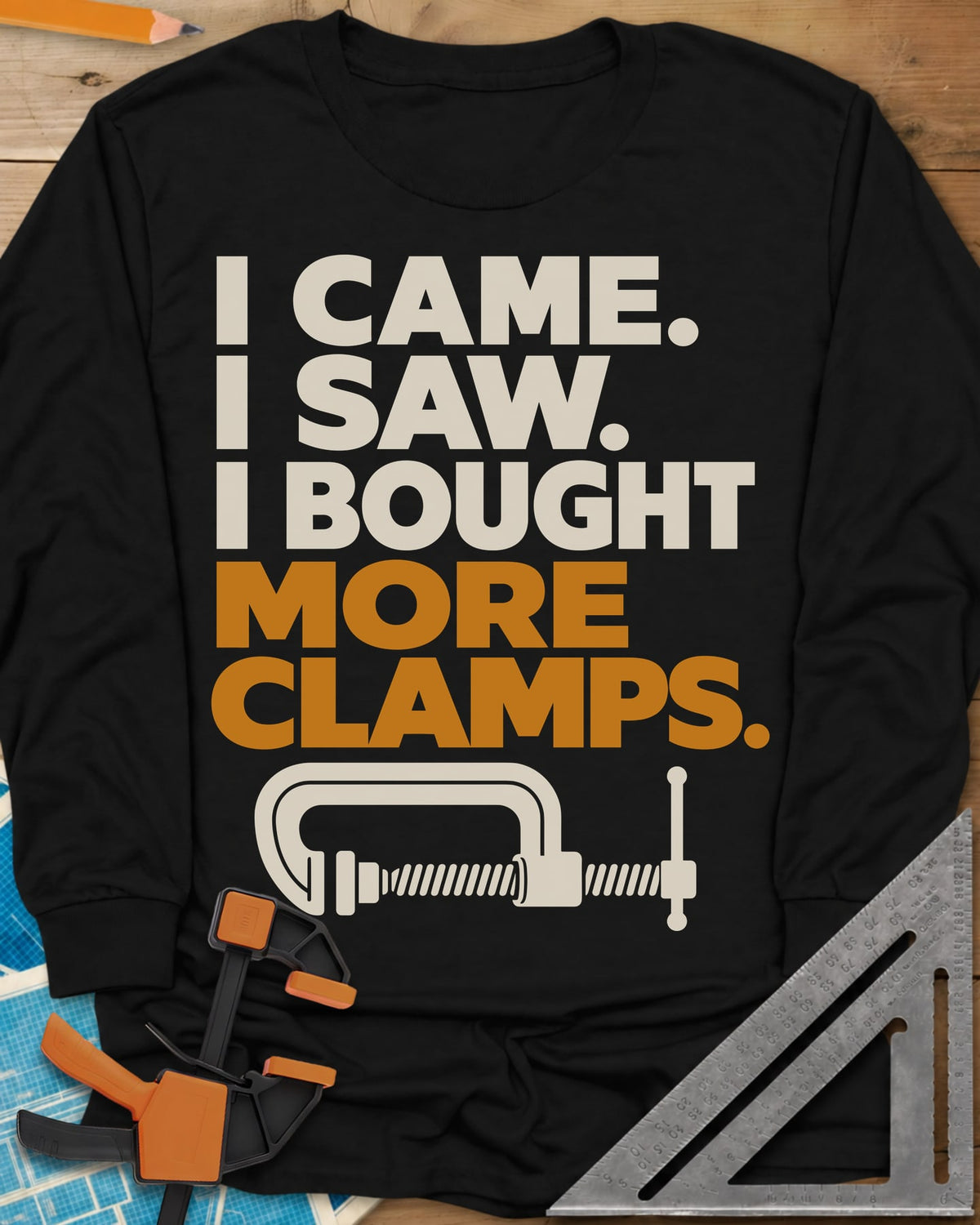 More Clamps long sleeve shirt in Black, four lines of block letters with a C-clamp underneath