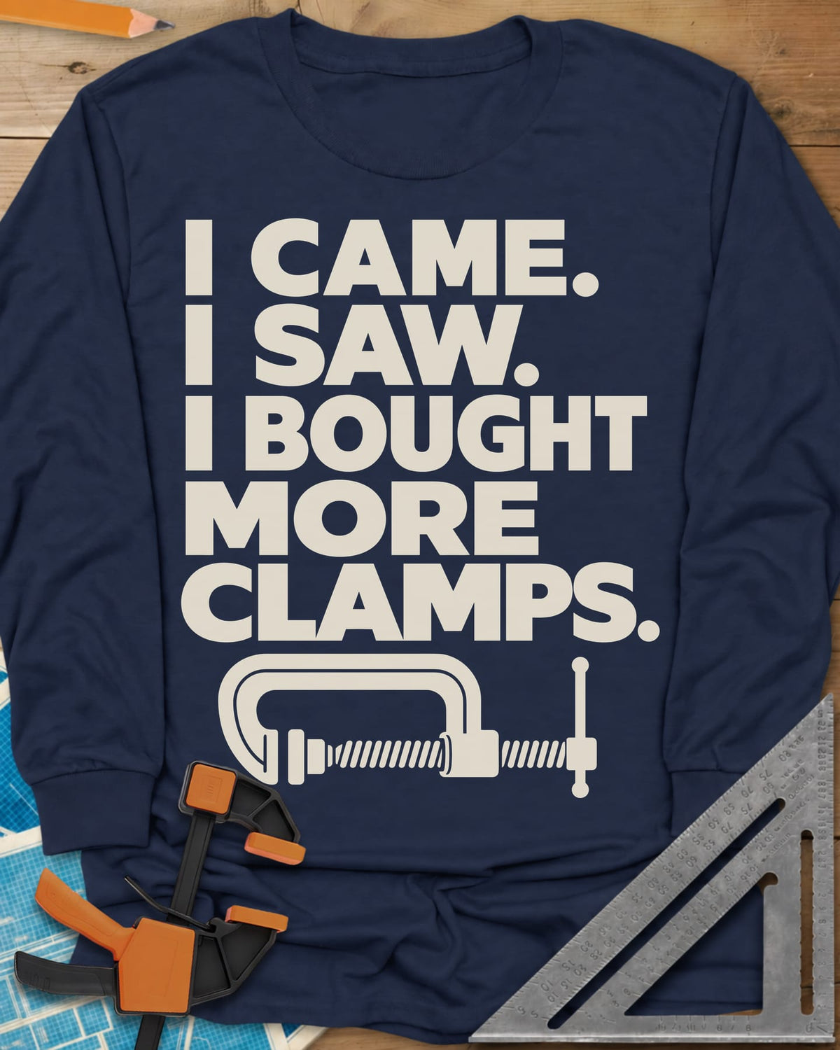 More Clamps long sleeve shirt in Navy, four lines of block letters with a C-clamp underneath