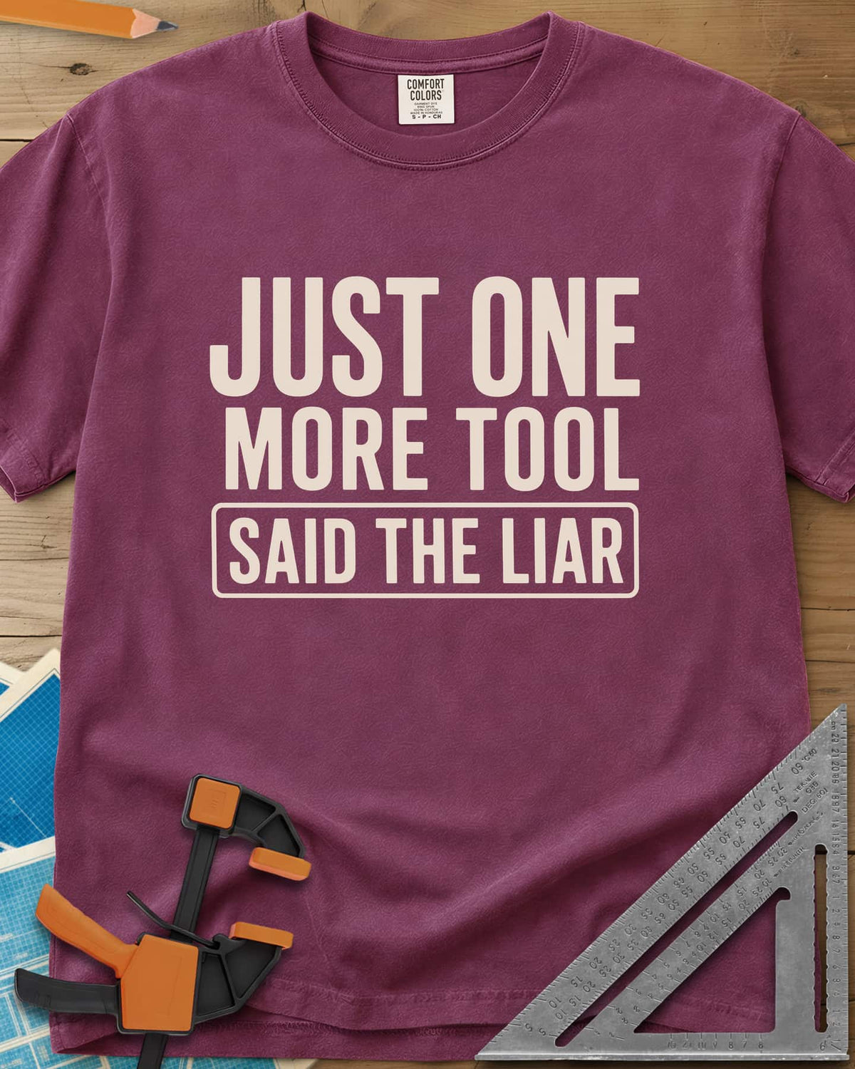 More Tools heavyweight tee in Berry, bold condensed capitals with the last line in a rounded box