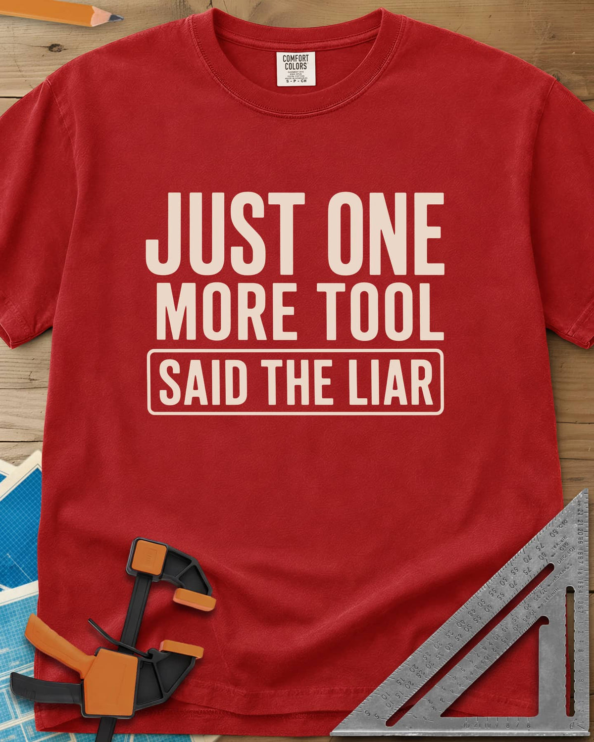 More Tools heavyweight tee in Red, bold condensed capitals with the last line in a rounded box