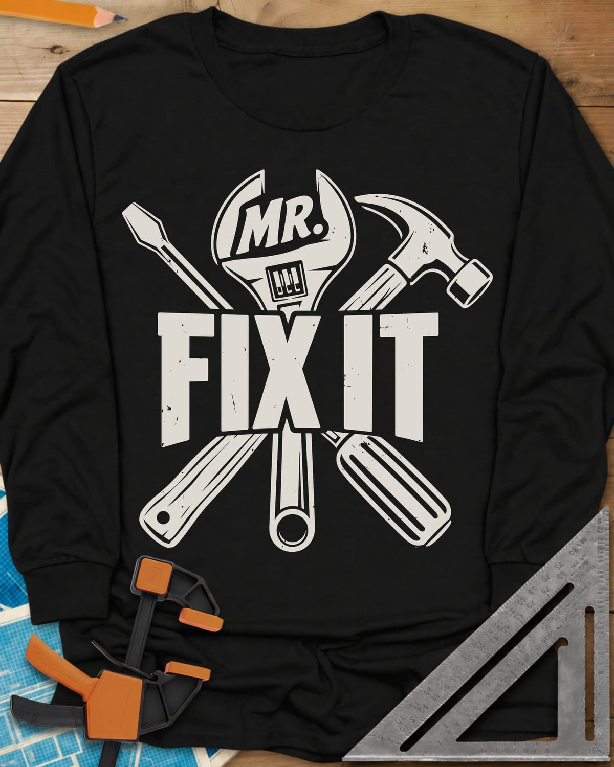 Mr. Fix It long sleeve shirt in Black, crossed wrench, hammer and screwdriver behind block letters