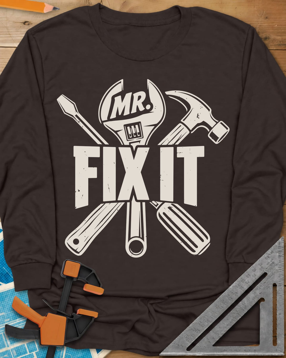 Mr. Fix It long sleeve shirt in Dark Chocolate, crossed wrench, hammer and screwdriver behind block letters
