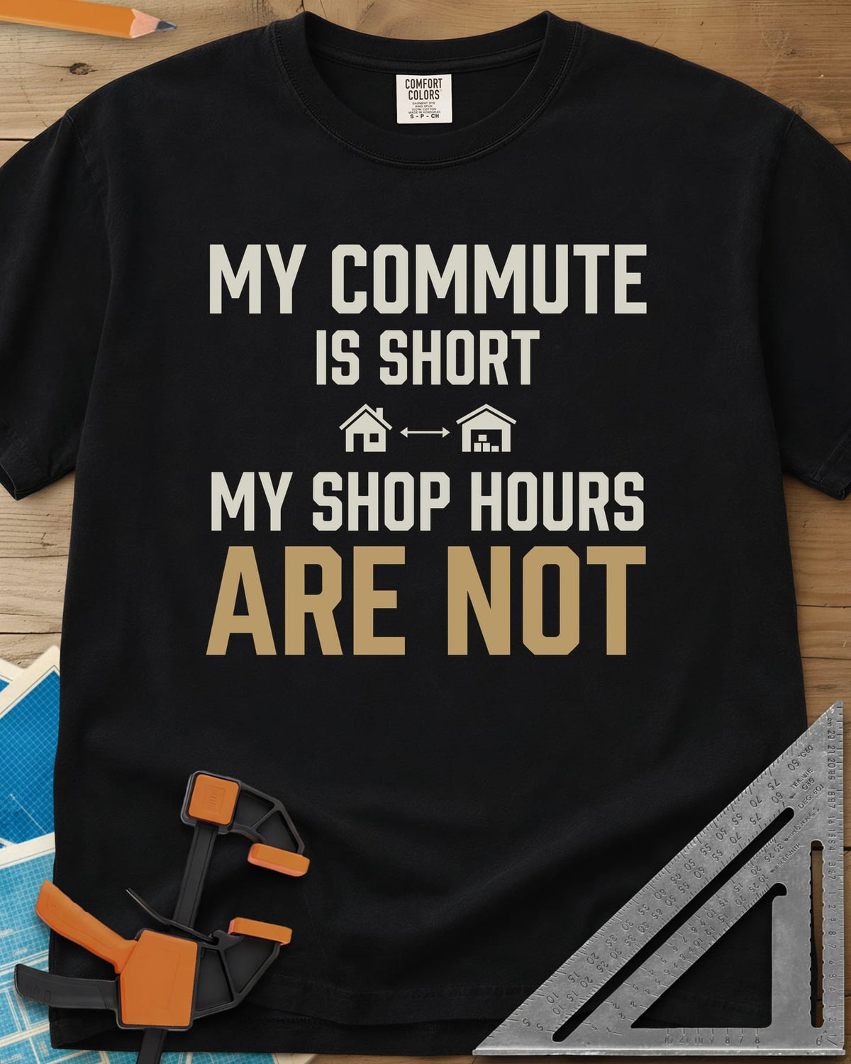 My Commute Is Short heavyweight tee in Black, bold lettering with a house and garage joined by a double arrow