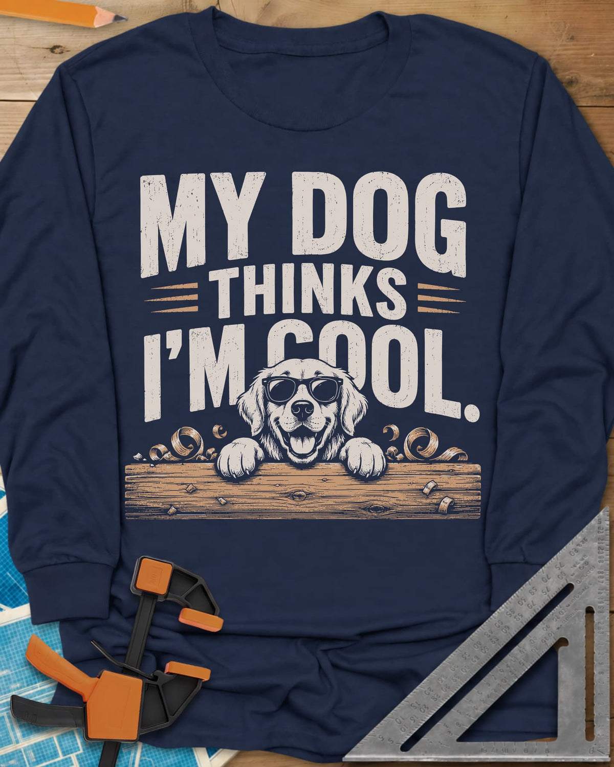 My Dog Thinks I’m Cool long sleeve shirt in Navy, a golden retriever in sunglasses peeking over a wood plank