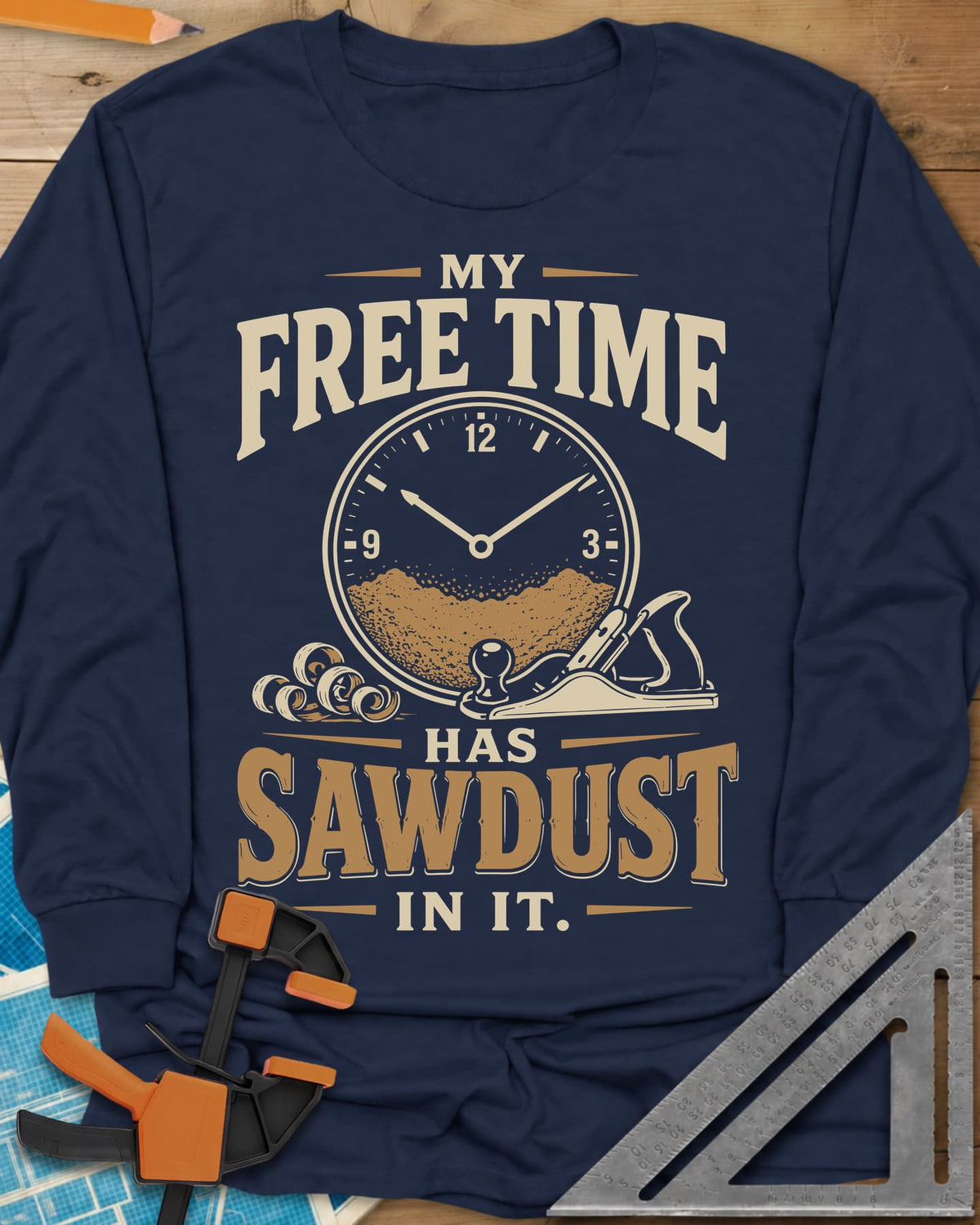 My Free Time Has Sawdust In It long sleeve shirt in Navy, a clock face half full of sawdust beside a hand plane and shavings