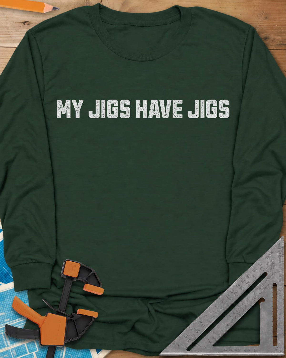 My Jigs Have Jigs long sleeve shirt in Forest Green, one line of worn block letters, no graphic