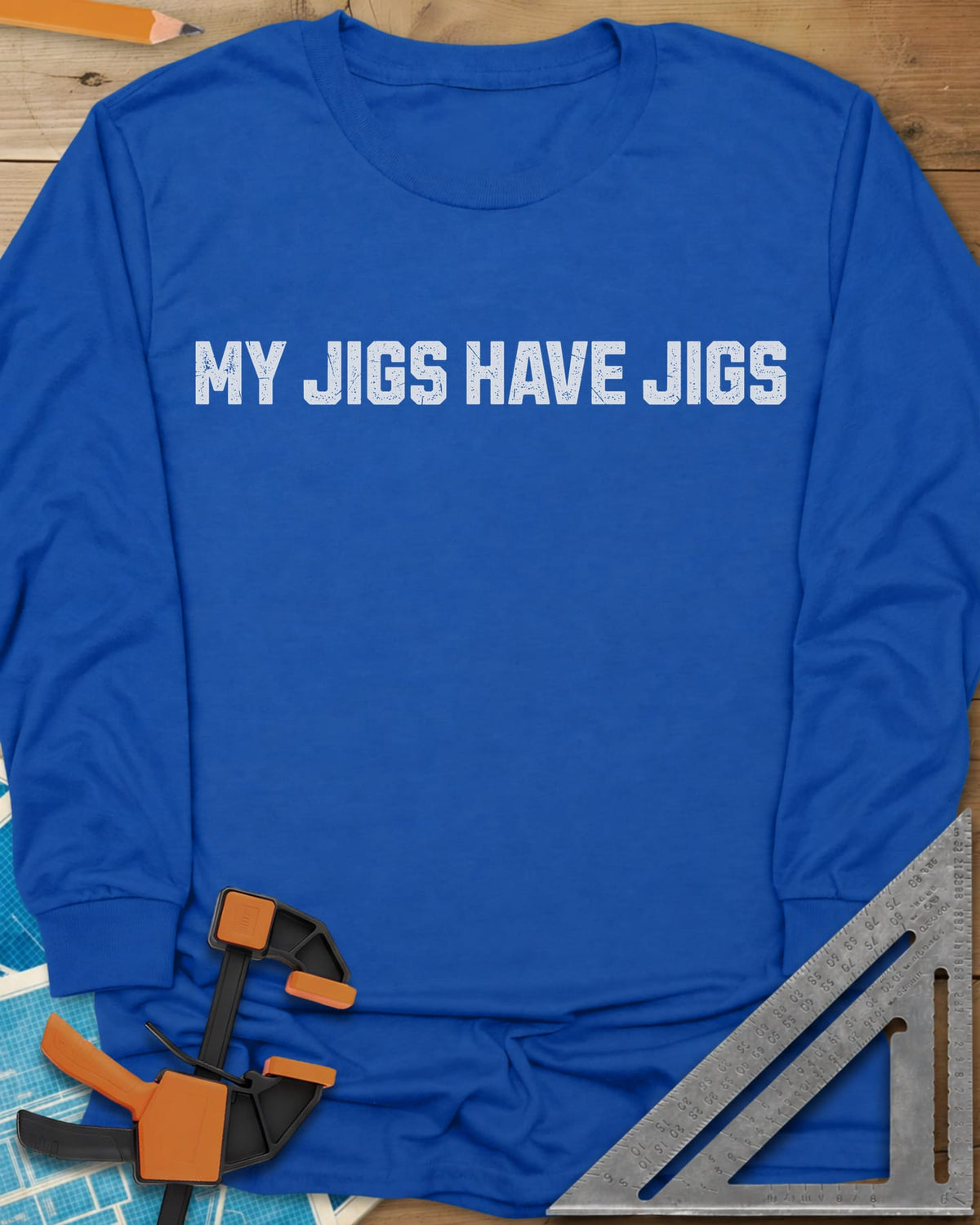 My Jigs Have Jigs long sleeve shirt in Royal, one line of worn block letters, no graphic