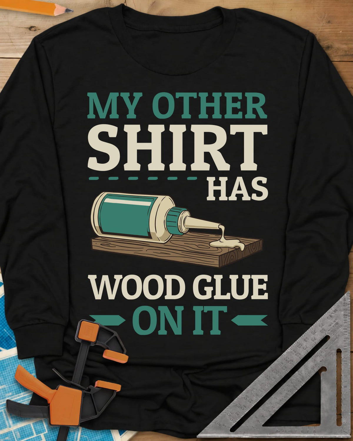 My Other Shirt Has Wood Glue On It long sleeve shirt in Black, a tipped-over wood glue bottle dripping onto a board
