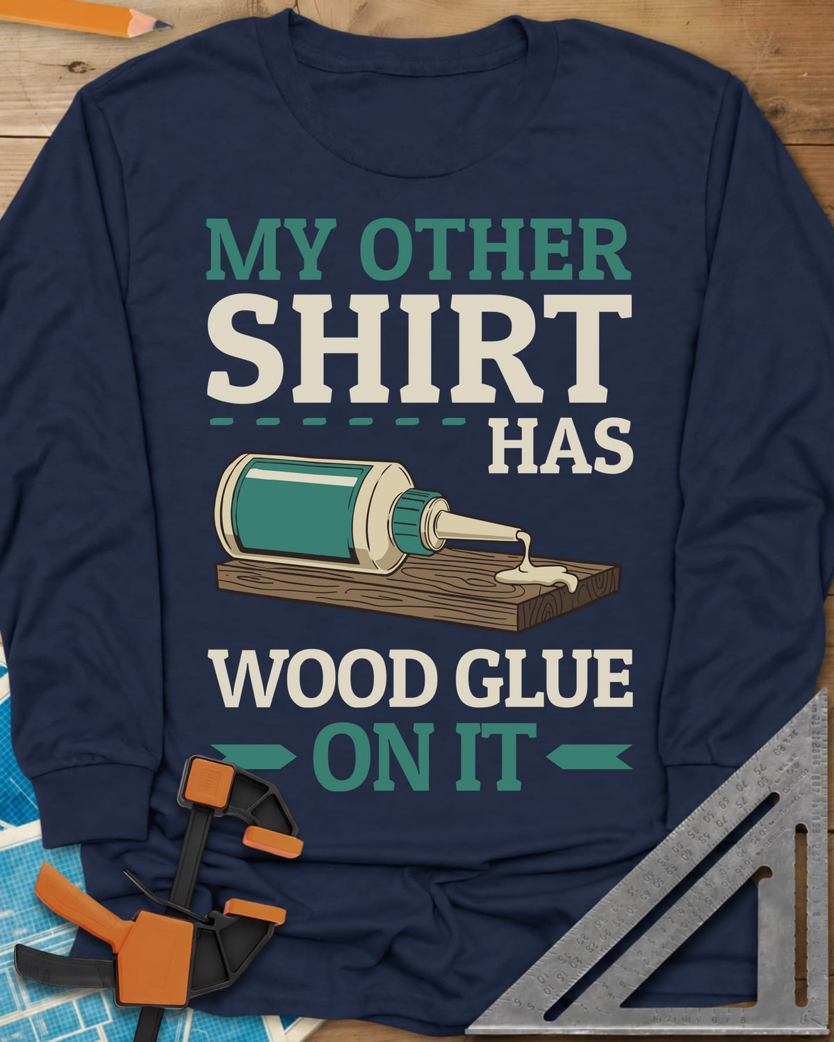 My Other Shirt Has Wood Glue On It long sleeve shirt in Navy, a tipped-over wood glue bottle dripping onto a board