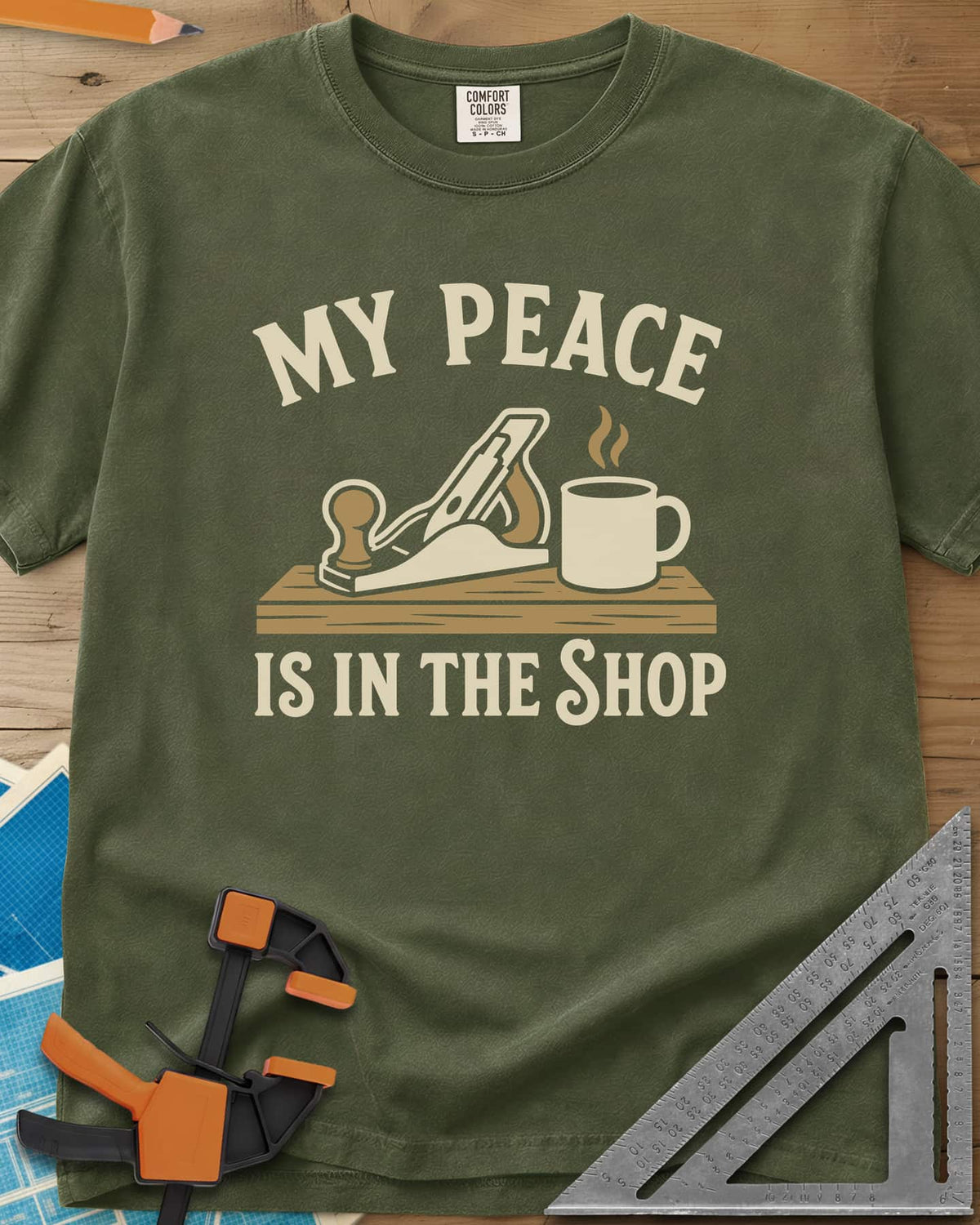My Peace Is In The Shop heavyweight tee in Hemp, a hand plane on a plank beside a steaming coffee mug