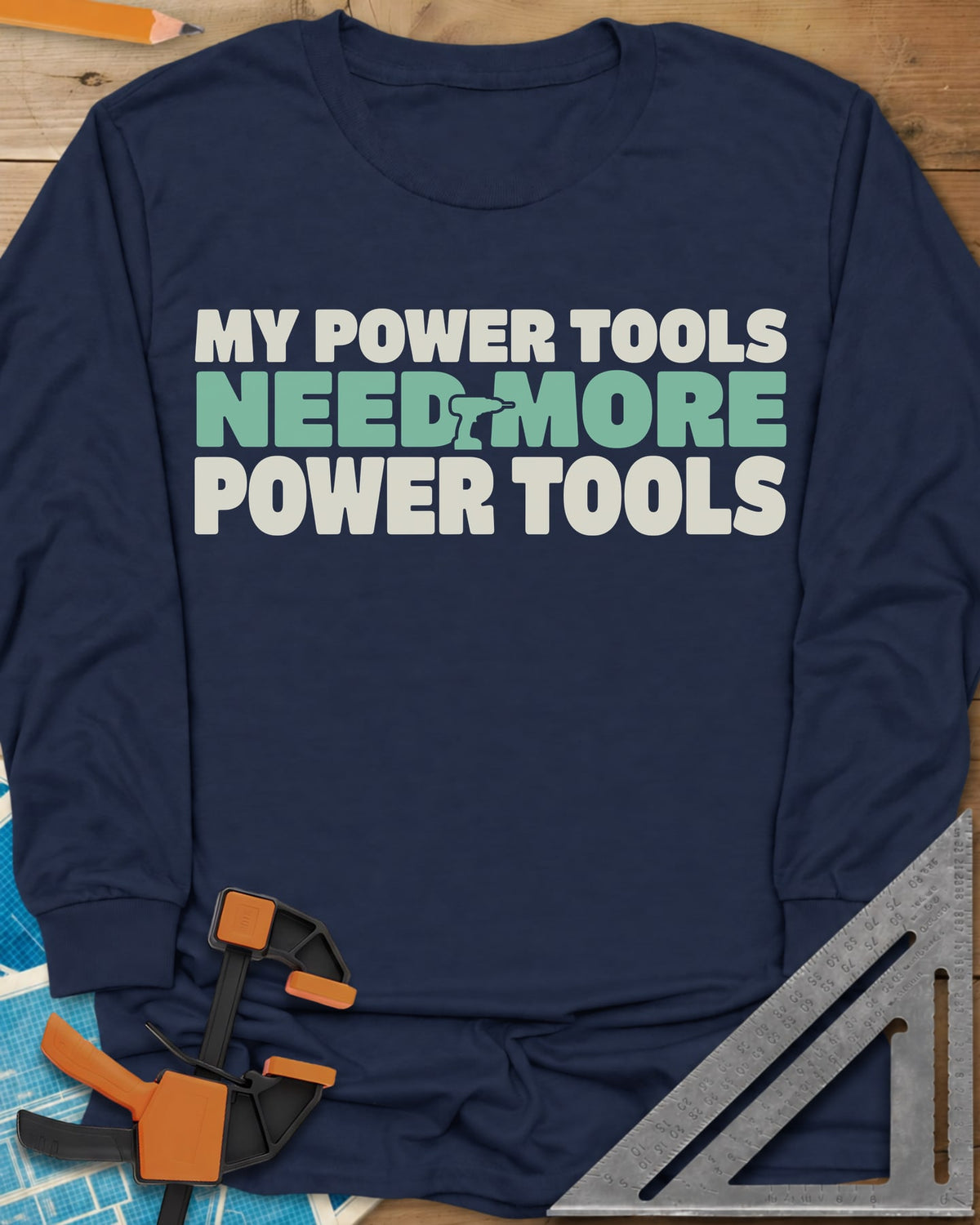 My Power Tools Need More Power Tools long sleeve shirt in Navy, bold three-line type with a tiny cordless drill in the middle