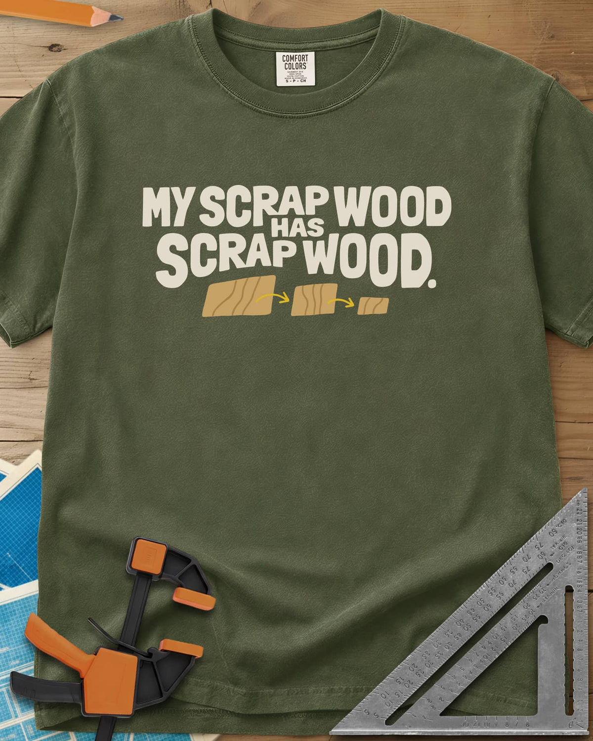 My Scrap Wood Has Scrap Wood heavyweight tee in Hemp, three wood pieces getting smaller, linked by orange arrows