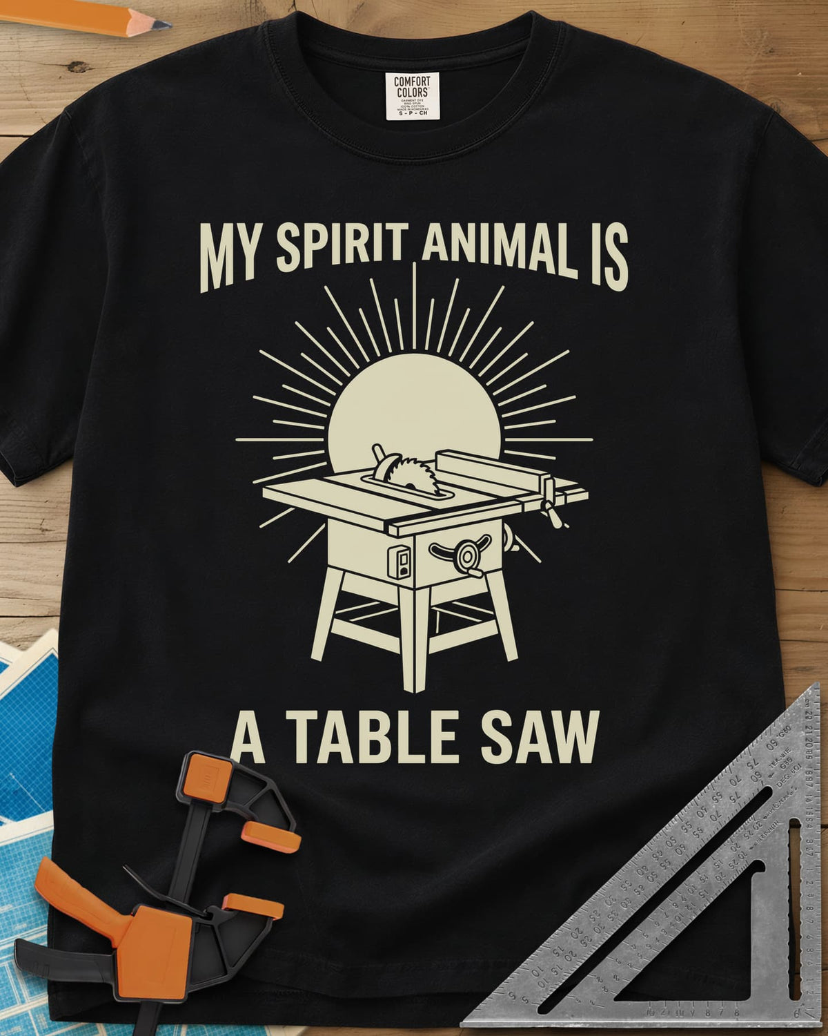 My Spirit Animal Is A Table Saw heavyweight tee in Black, a table saw drawn in front of a sunburst