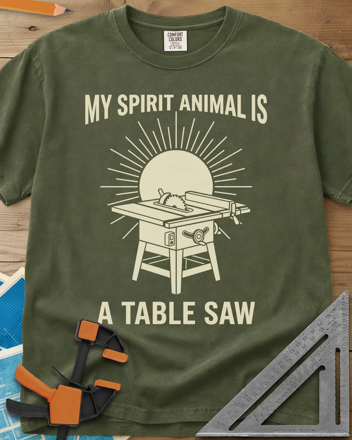 My Spirit Animal Is A Table Saw heavyweight tee in Hemp, a table saw drawn in front of a sunburst