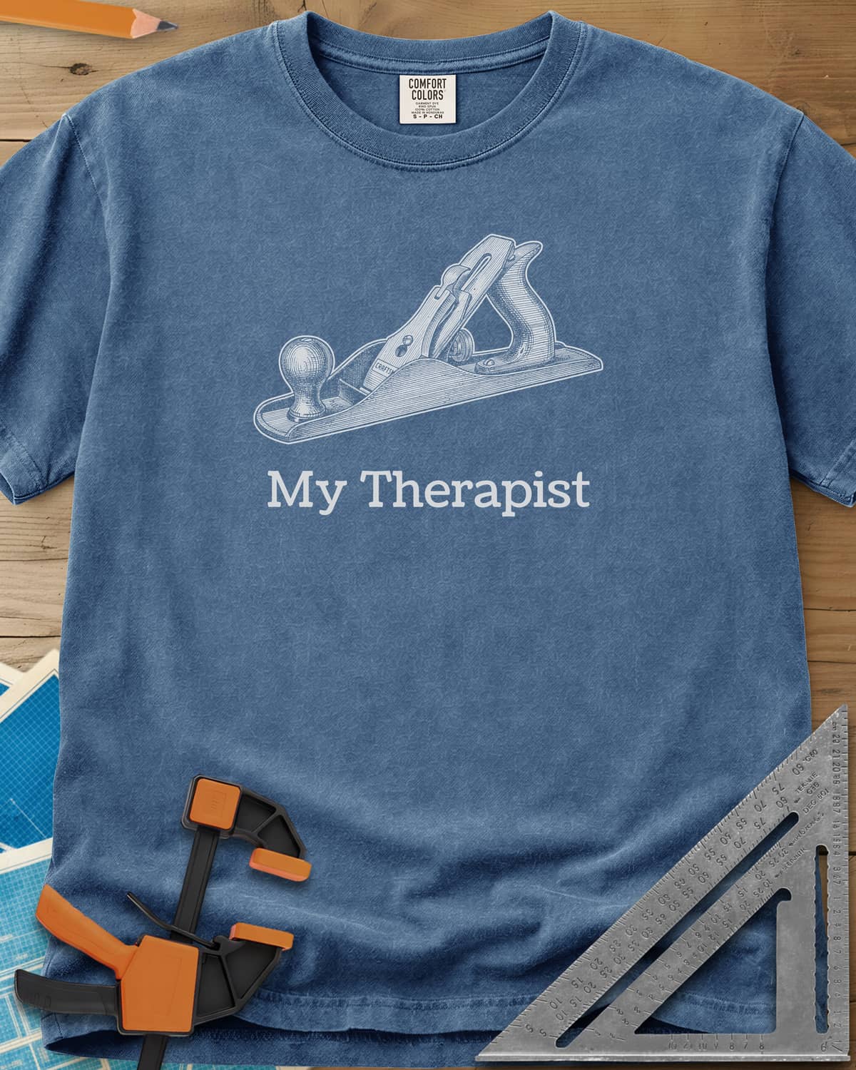 My Therapist heavyweight tee in Blue Jean, finely engraved bench hand plane above serif lettering