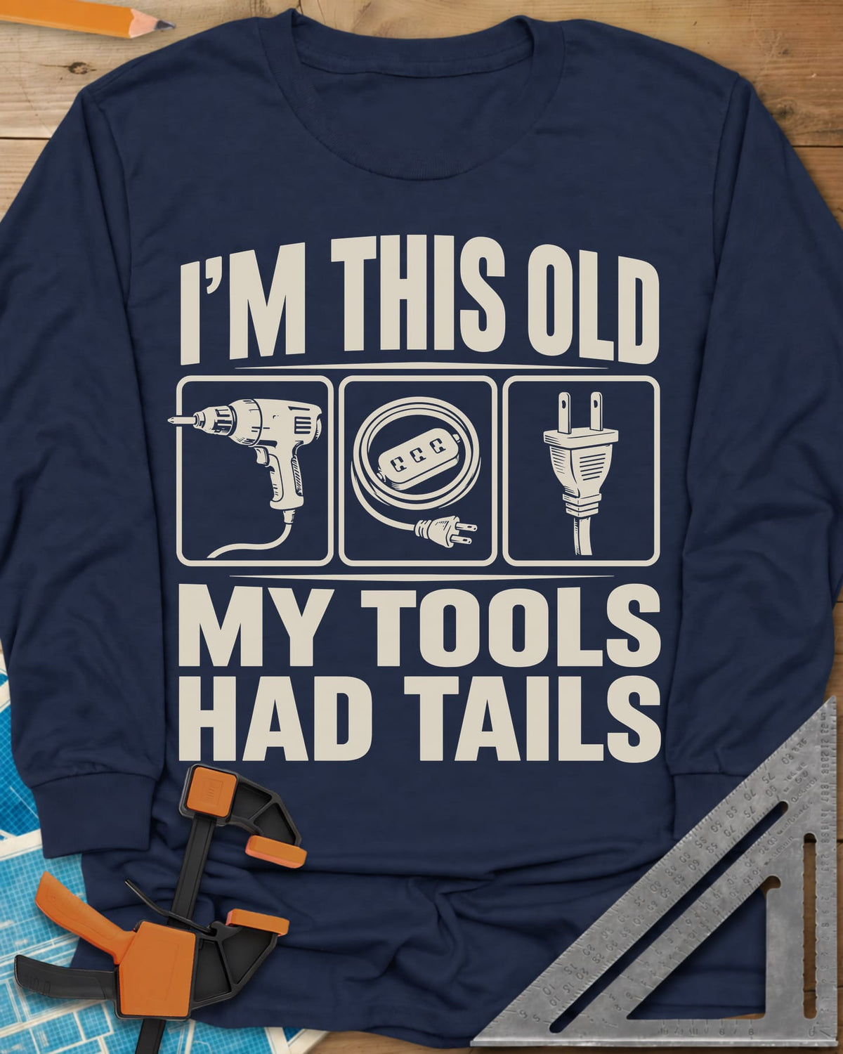 My Tools Had Tails long sleeve shirt in Navy, three framed panels: a corded drill, an extension cord, a plug