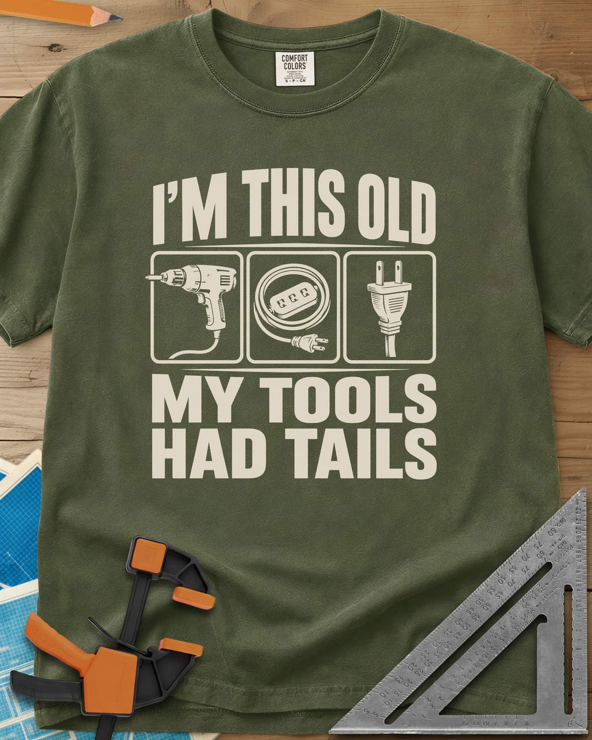 My Tools Had Tails heavyweight tee in Hemp, three framed panels: a corded drill, an extension cord, a plug