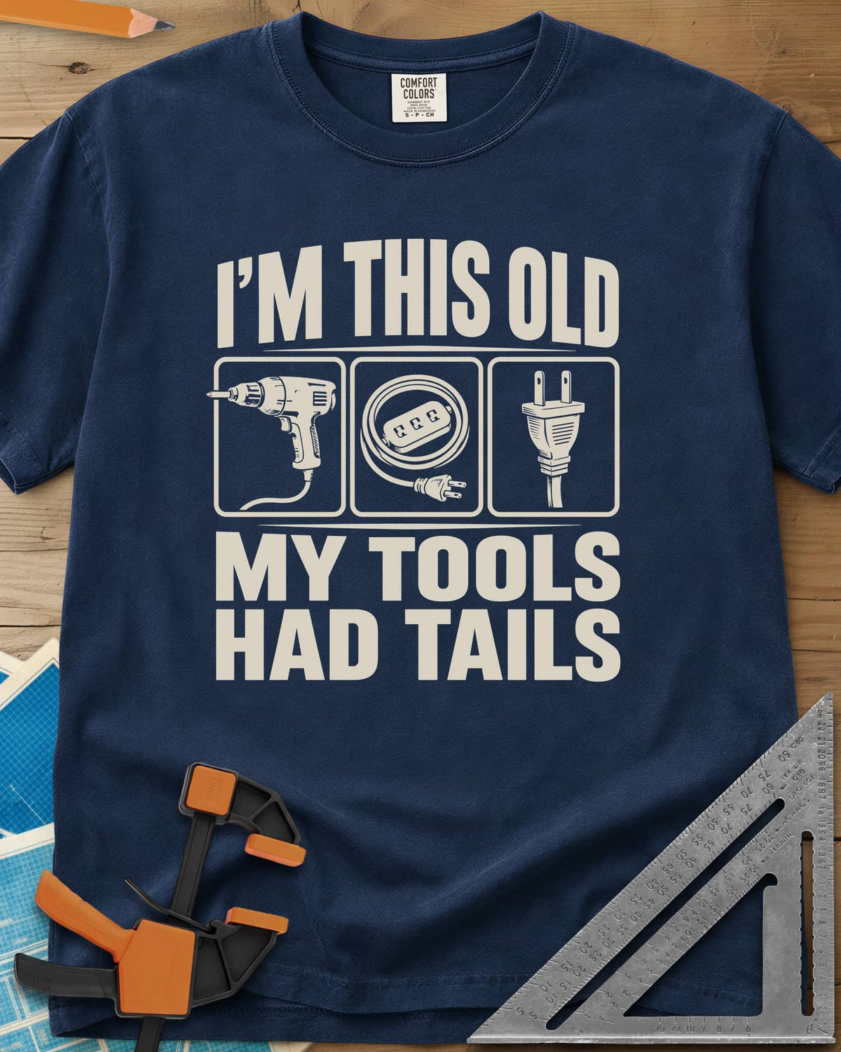 My Tools Had Tails heavyweight tee in Navy, three framed panels: a corded drill, an extension cord, a plug