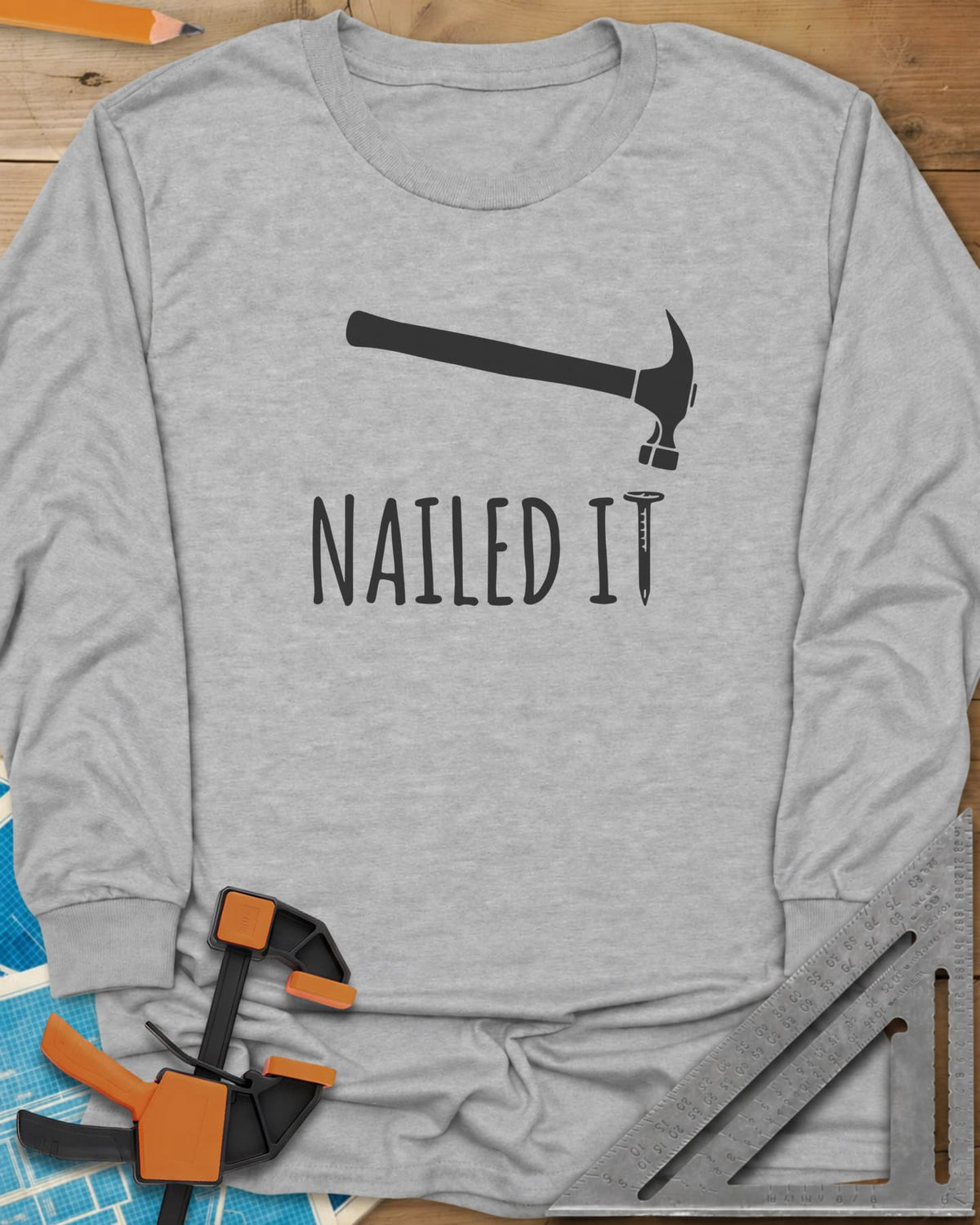 Nailed It long sleeve shirt in Sport Grey, a hammer over a nail that forms the T in IT