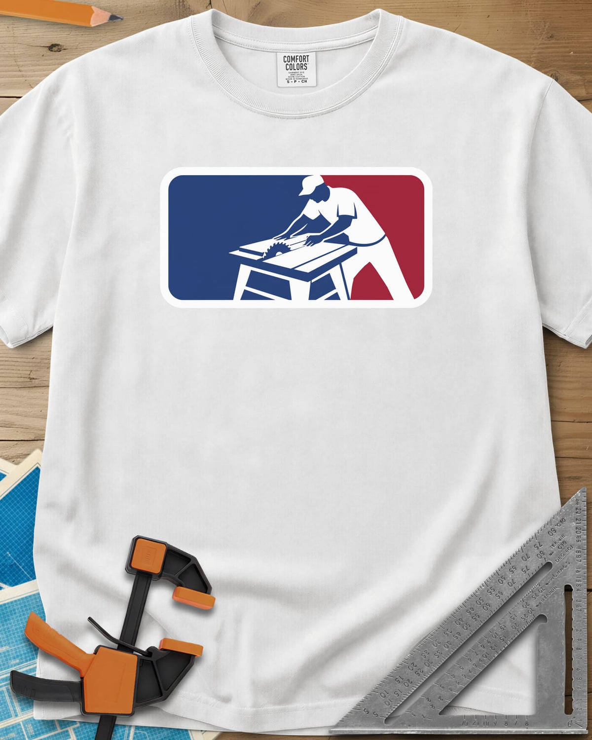 National Woodworking Association heavyweight tee in White, a worker in a cap leaning over a table saw in a red and blue badge