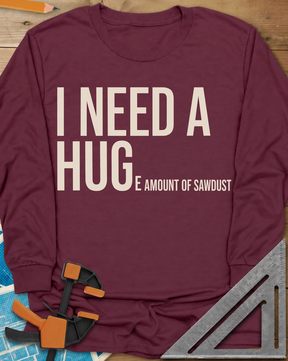 Need Sawdust long sleeve shirt in Maroon, tall condensed type that shrinks partway through a word