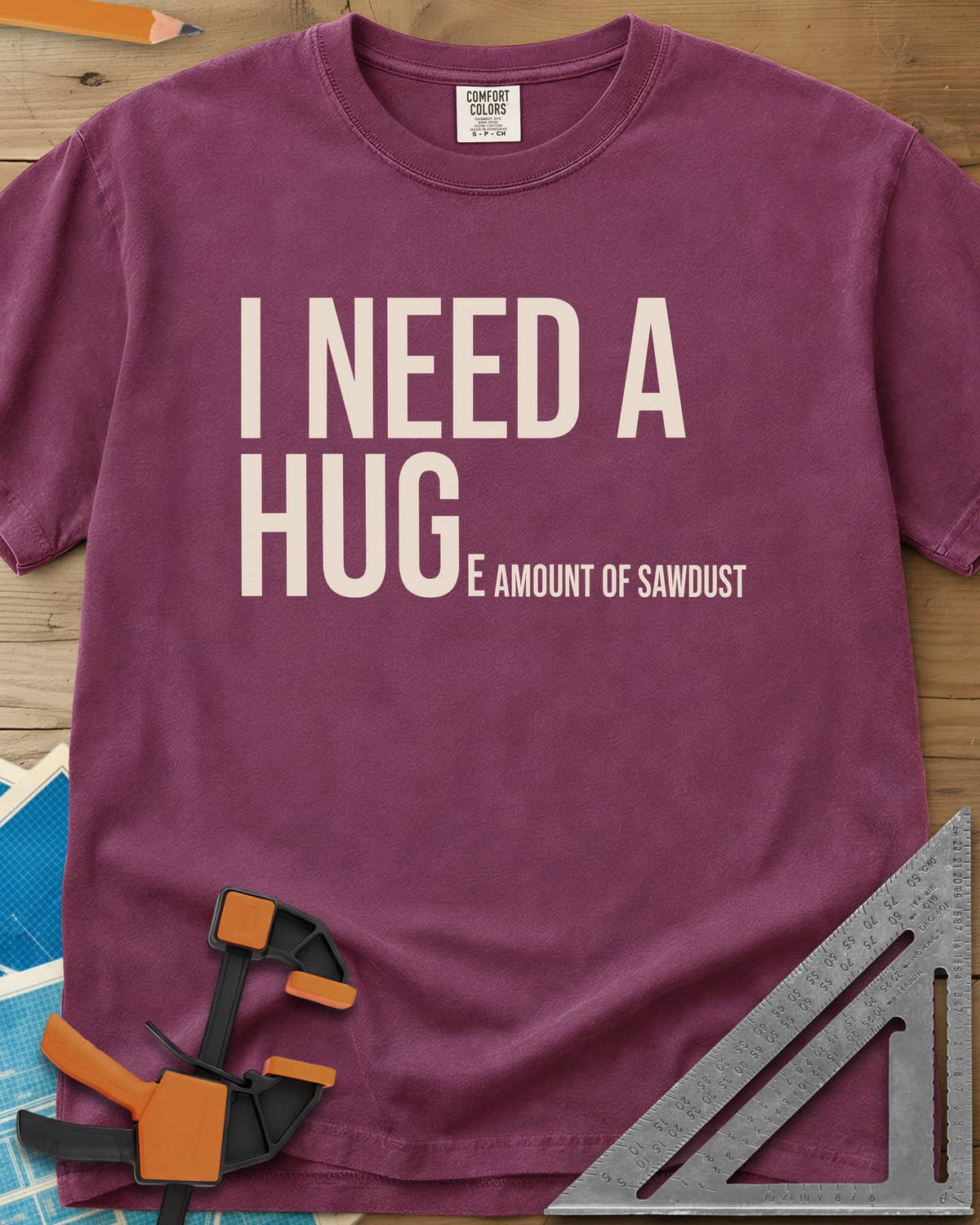 Need Sawdust heavyweight tee in Berry, tall condensed type that shrinks partway through a word