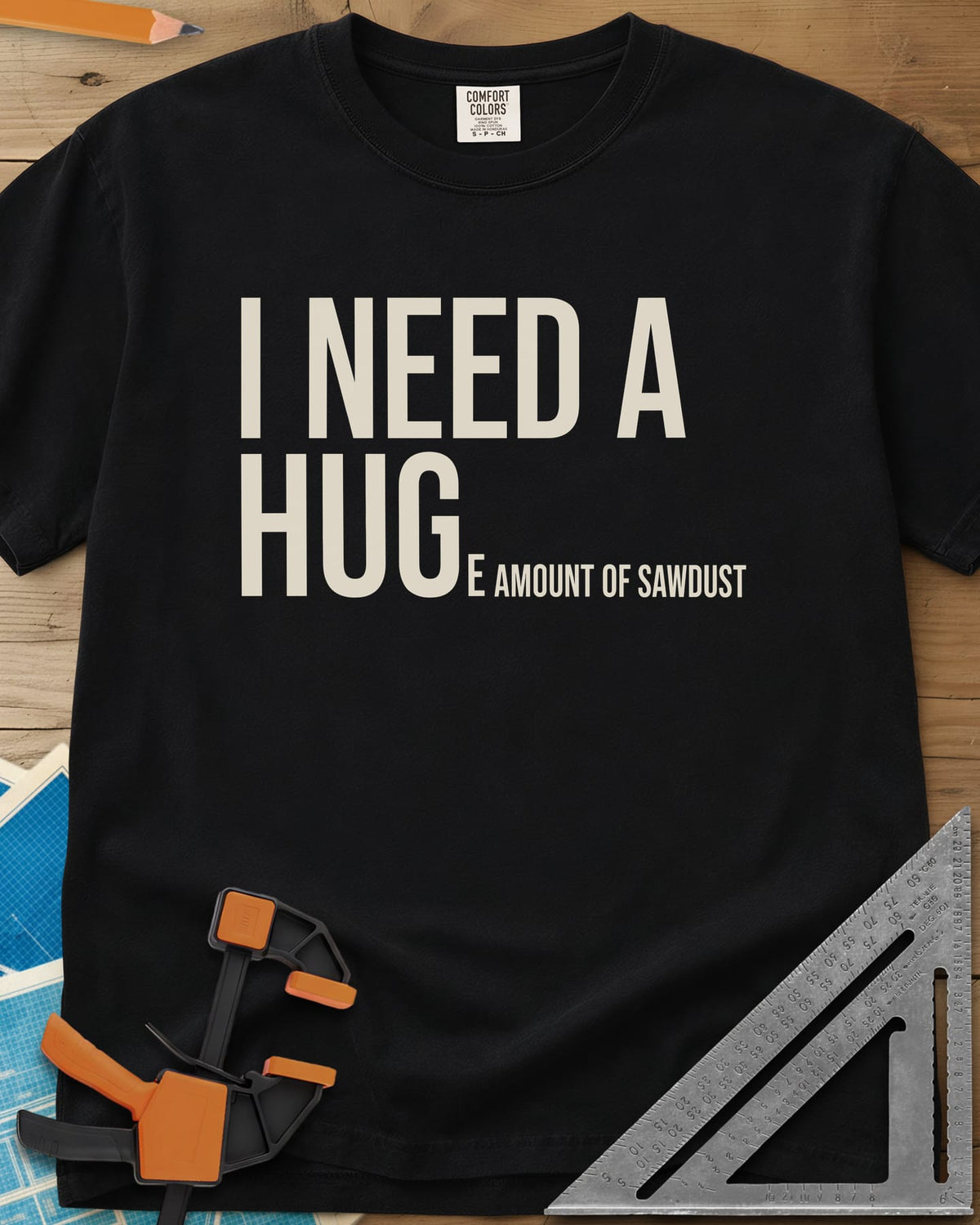 Need Sawdust heavyweight tee in Black, tall condensed type that shrinks partway through a word