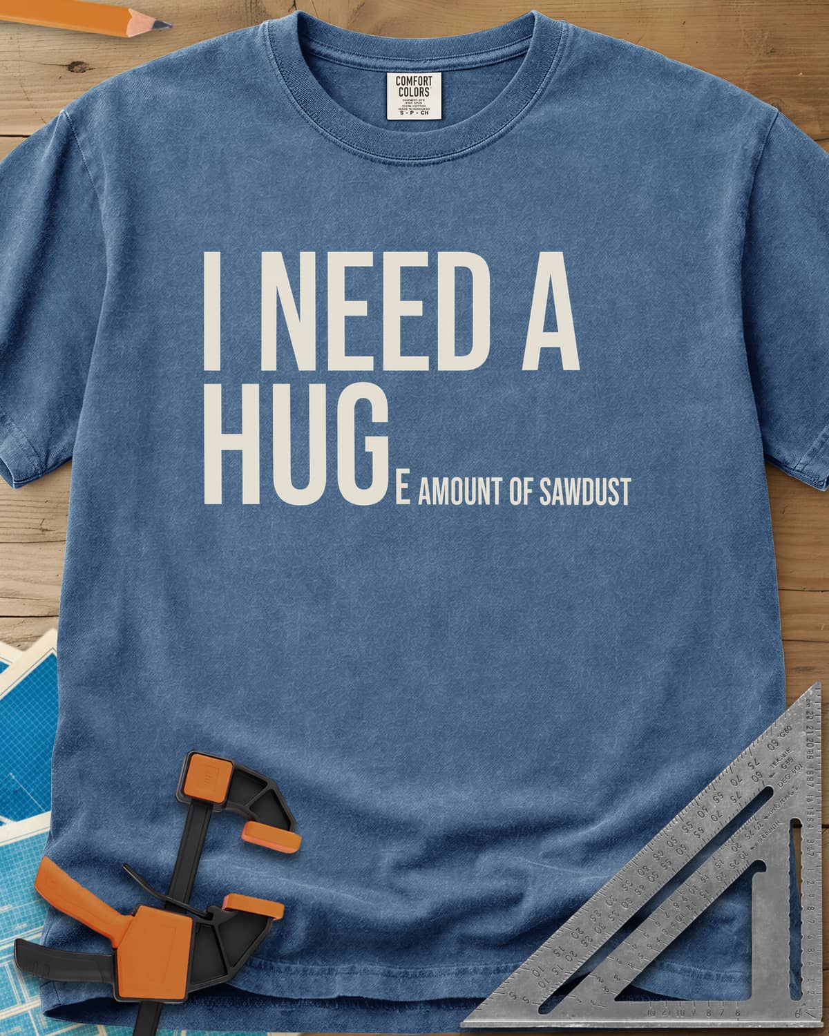 Need Sawdust heavyweight tee in Blue Jean, tall condensed type that shrinks partway through a word
