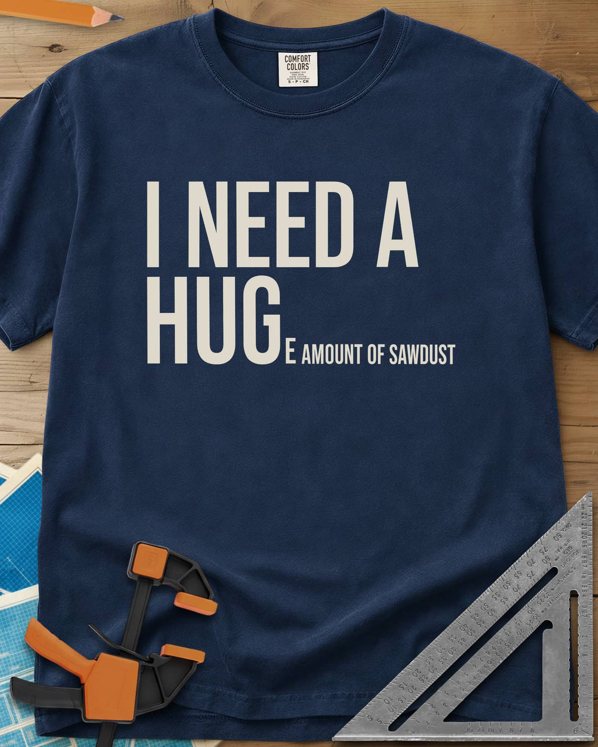 Need Sawdust heavyweight tee in Navy, tall condensed type that shrinks partway through a word