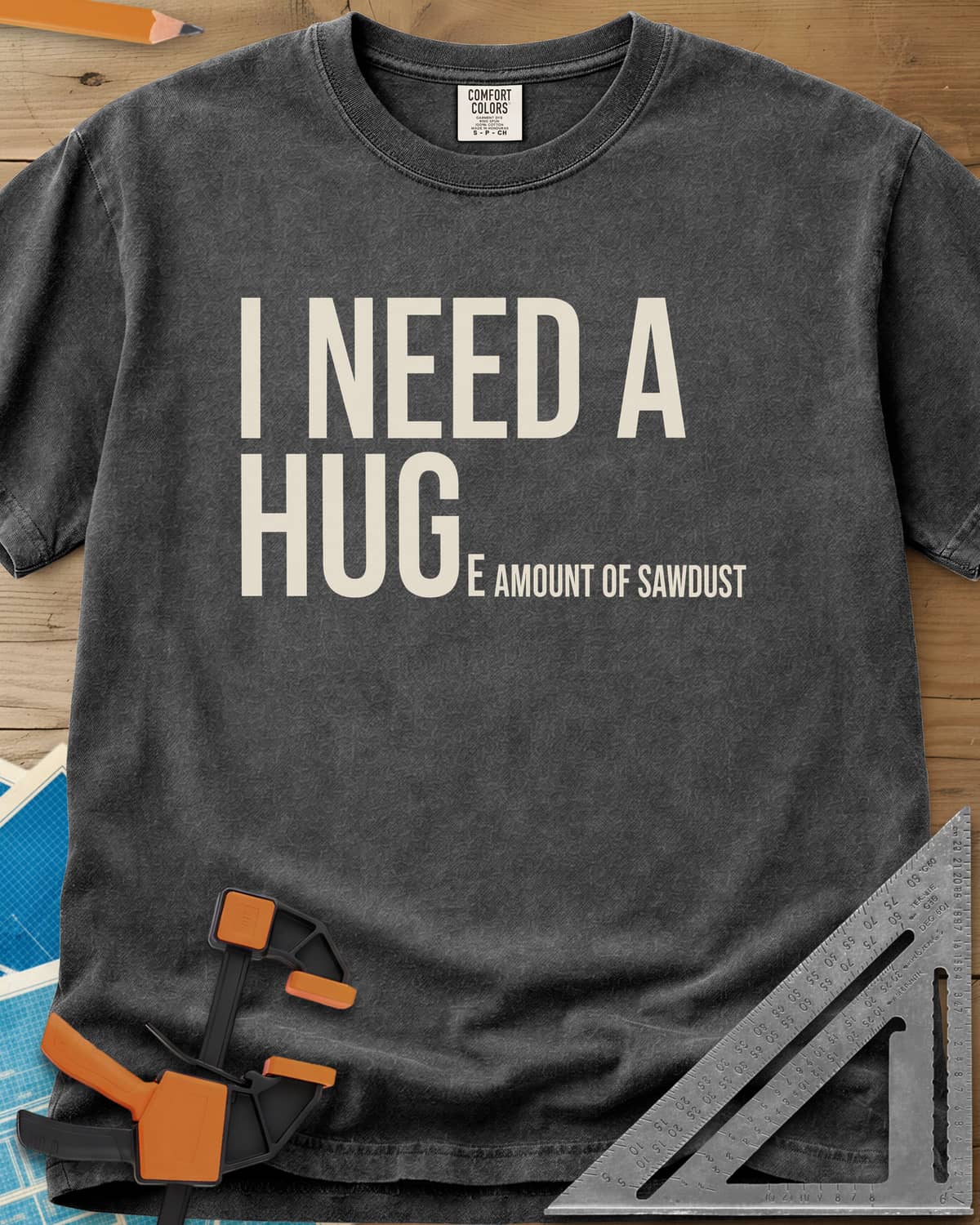 Need Sawdust heavyweight tee in Pepper, tall condensed type that shrinks partway through a word