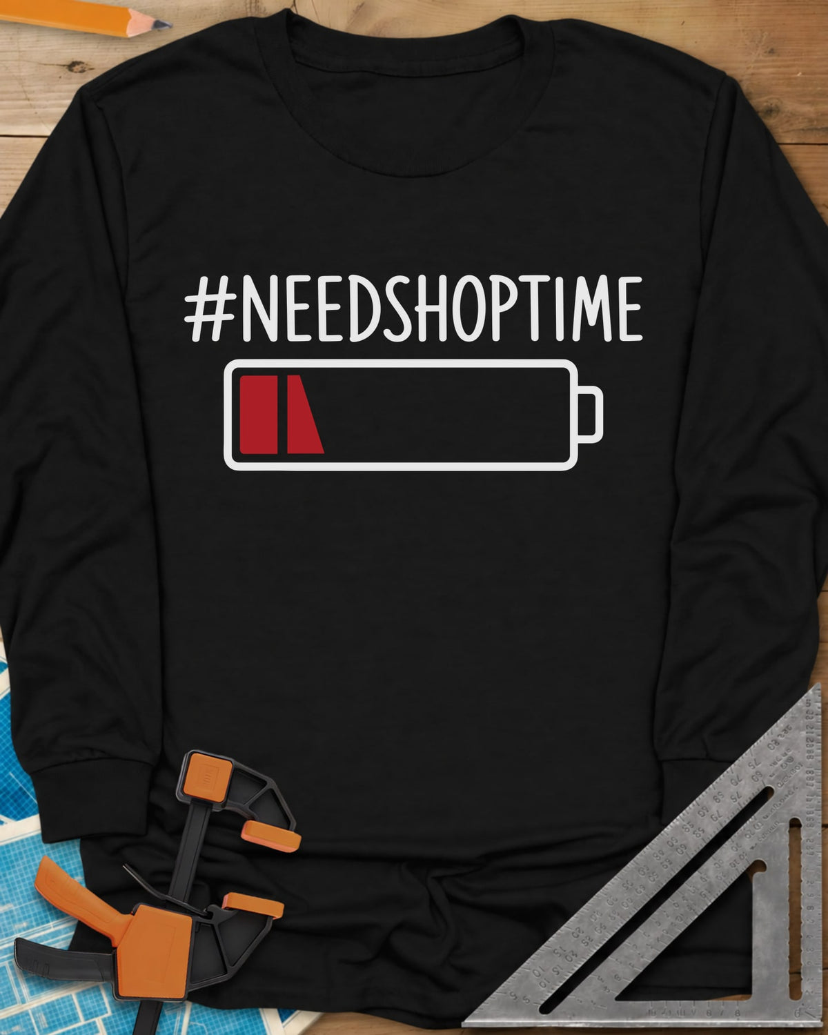 Need Shop Time long sleeve shirt in Black, hashtag text above a nearly empty red battery icon