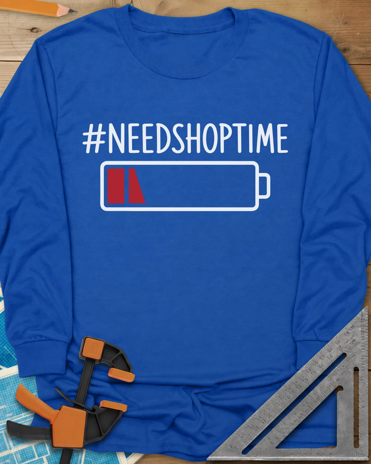 Need Shop Time long sleeve shirt in Royal, hashtag text above a nearly empty red battery icon