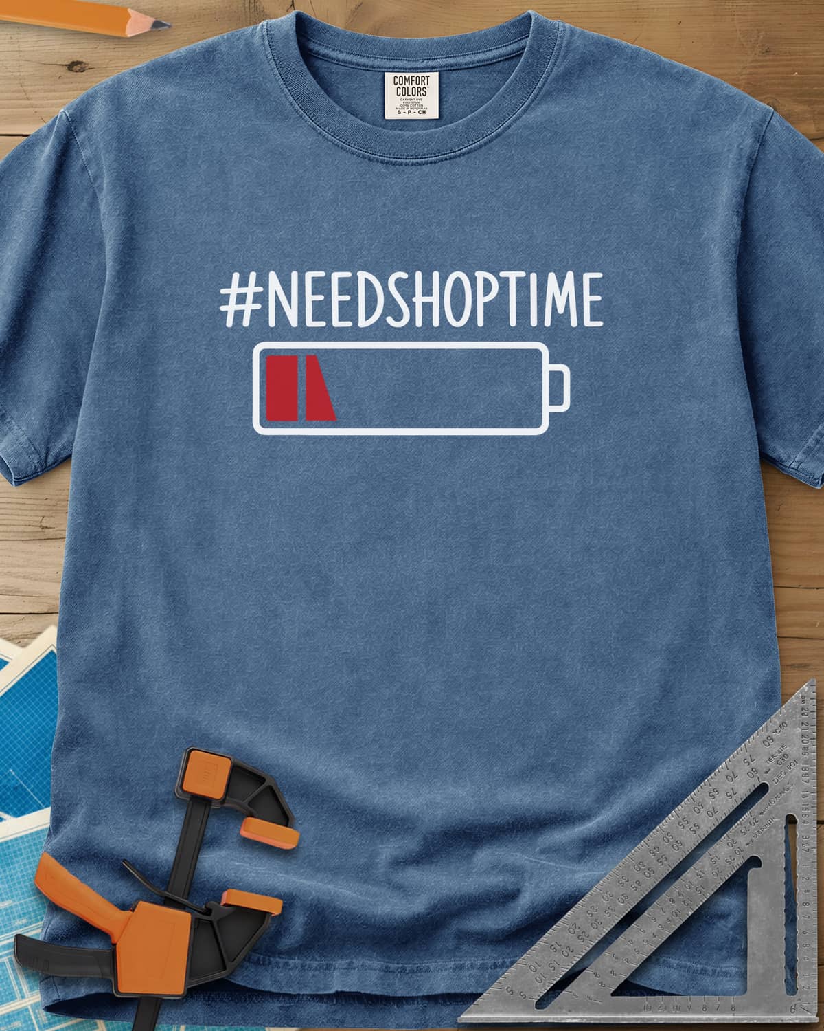 Need Shop Time heavyweight tee in Blue Jean, hashtag text above a nearly empty red battery icon