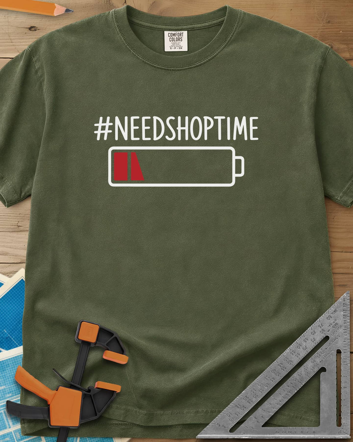 Need Shop Time heavyweight tee in Hemp, hashtag text above a nearly empty red battery icon