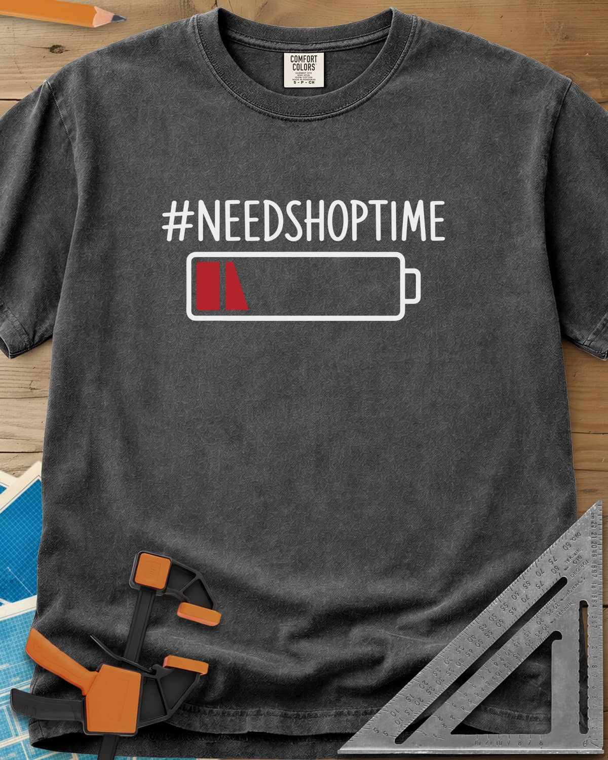 Need Shop Time heavyweight tee in Pepper, hashtag text above a nearly empty red battery icon