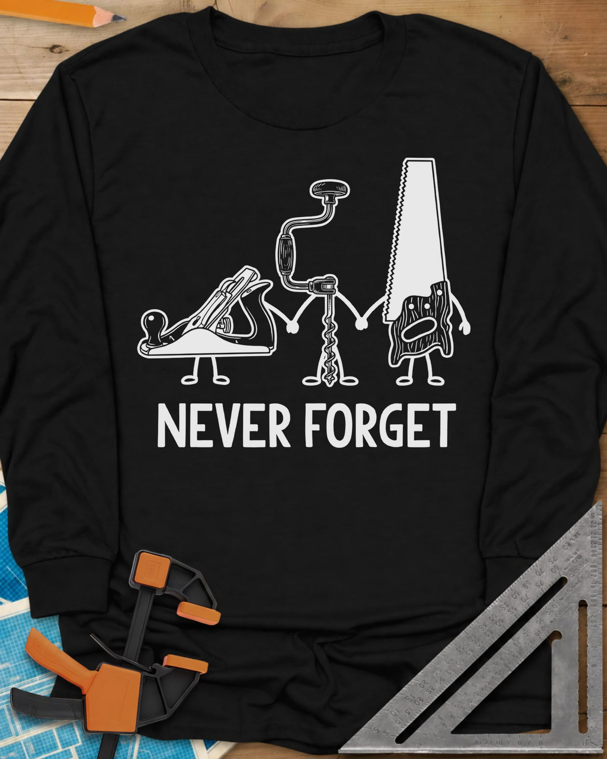 Never Forget long sleeve shirt in Black, three cartoon hand tools holding hands: a plane, a brace and a saw
