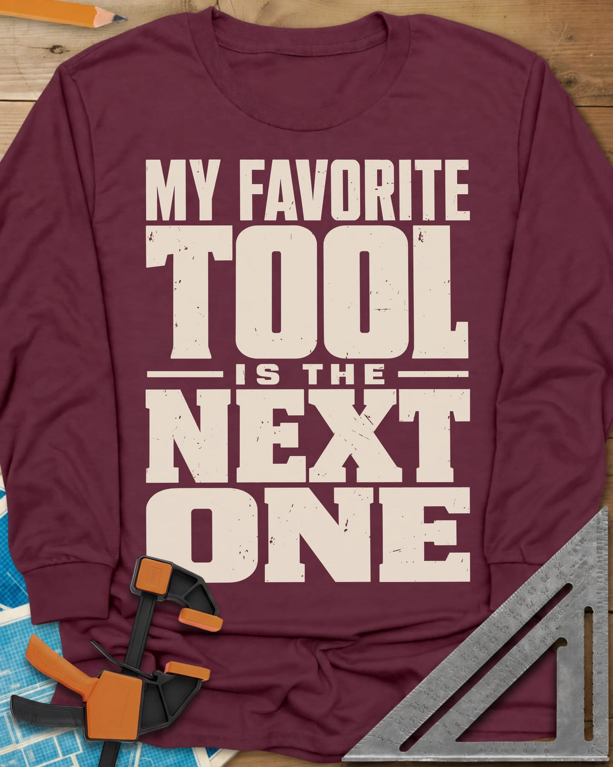 Next Tool long sleeve shirt in Maroon, stacked block letters with TOOL and NEXT ONE blown up large