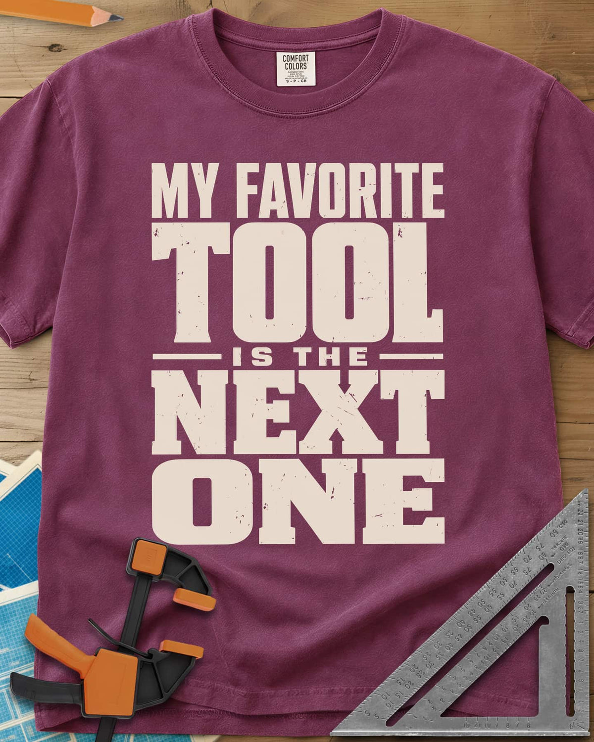 Next Tool heavyweight tee in Berry, stacked block letters with TOOL and NEXT ONE blown up large