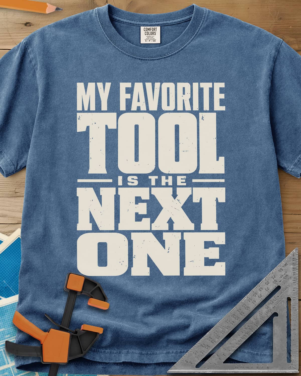 Next Tool heavyweight tee in Blue Jean, stacked block letters with TOOL and NEXT ONE blown up large