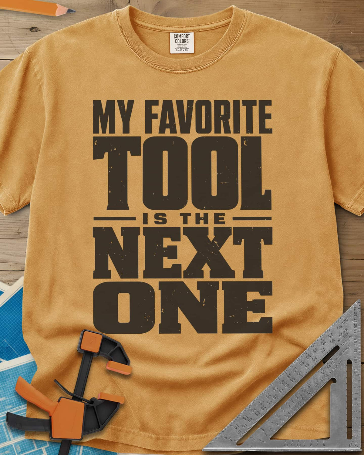 Next Tool heavyweight tee in Mustard, stacked block letters with TOOL and NEXT ONE blown up large