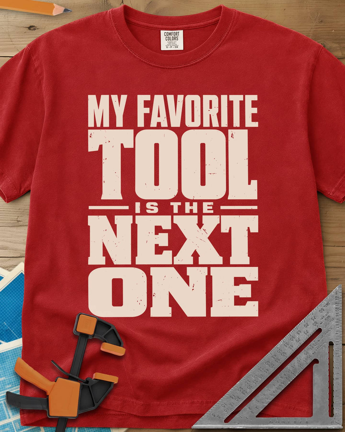 Next Tool heavyweight tee in Red, stacked block letters with TOOL and NEXT ONE blown up large