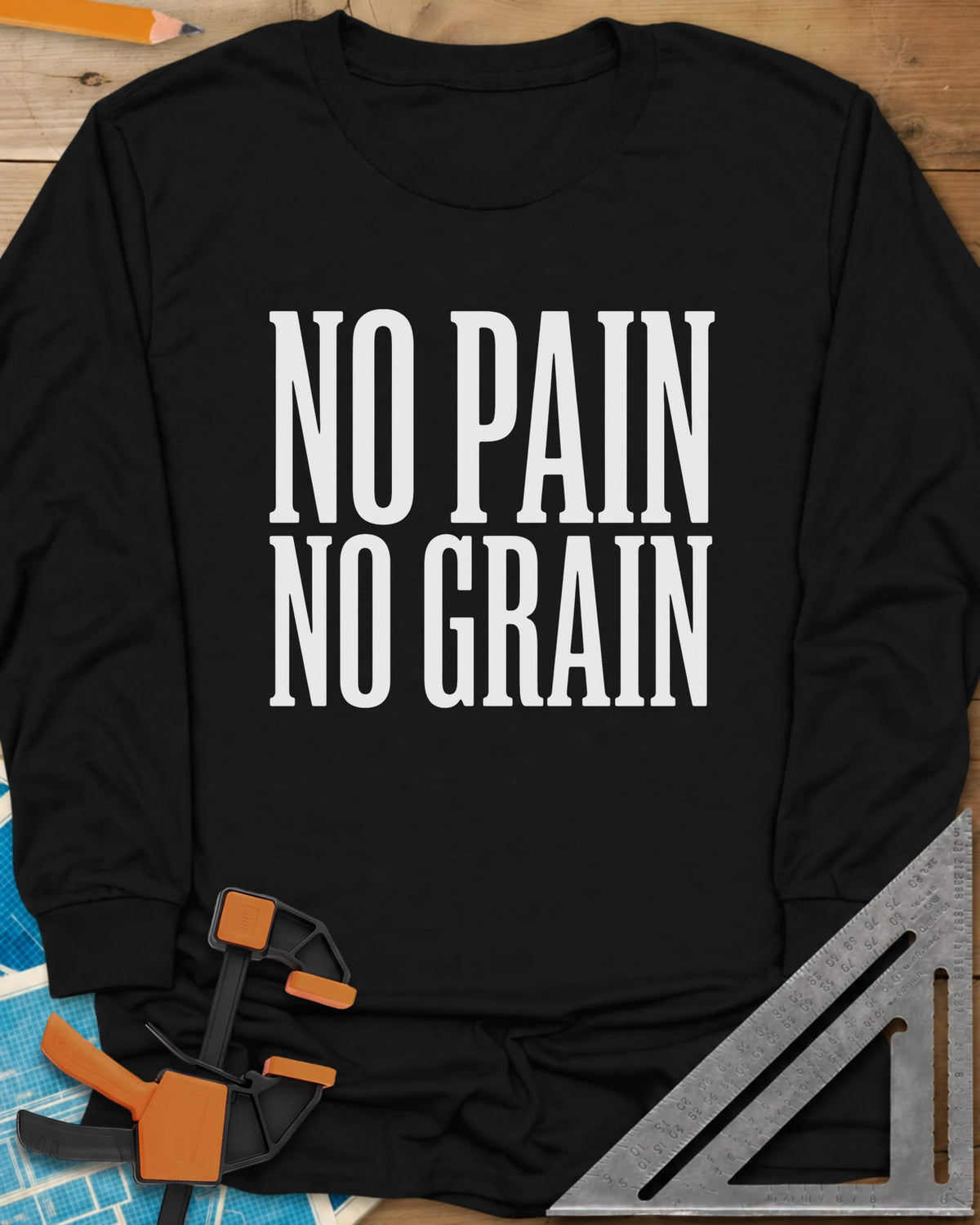 No Pain, No Grain long sleeve shirt in Black, two stacked lines of tall condensed white capitals, no graphic