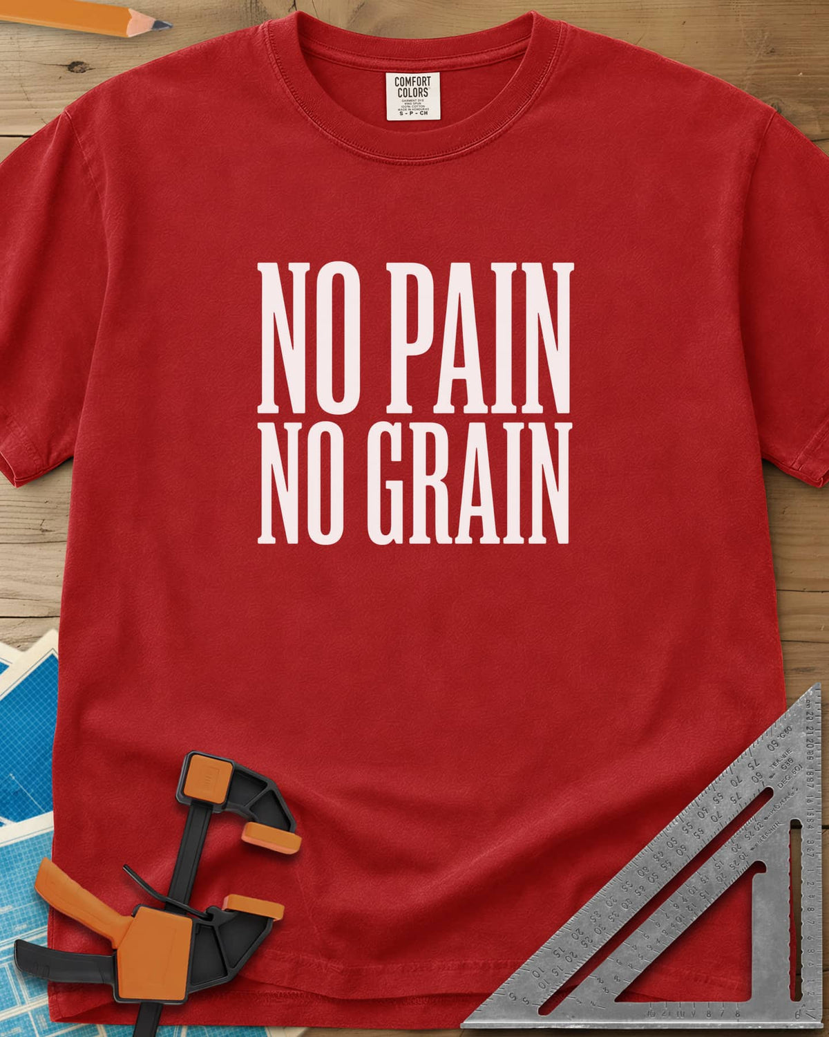 No Pain, No Grain heavyweight tee in Red, two stacked lines of tall condensed white capitals, no graphic