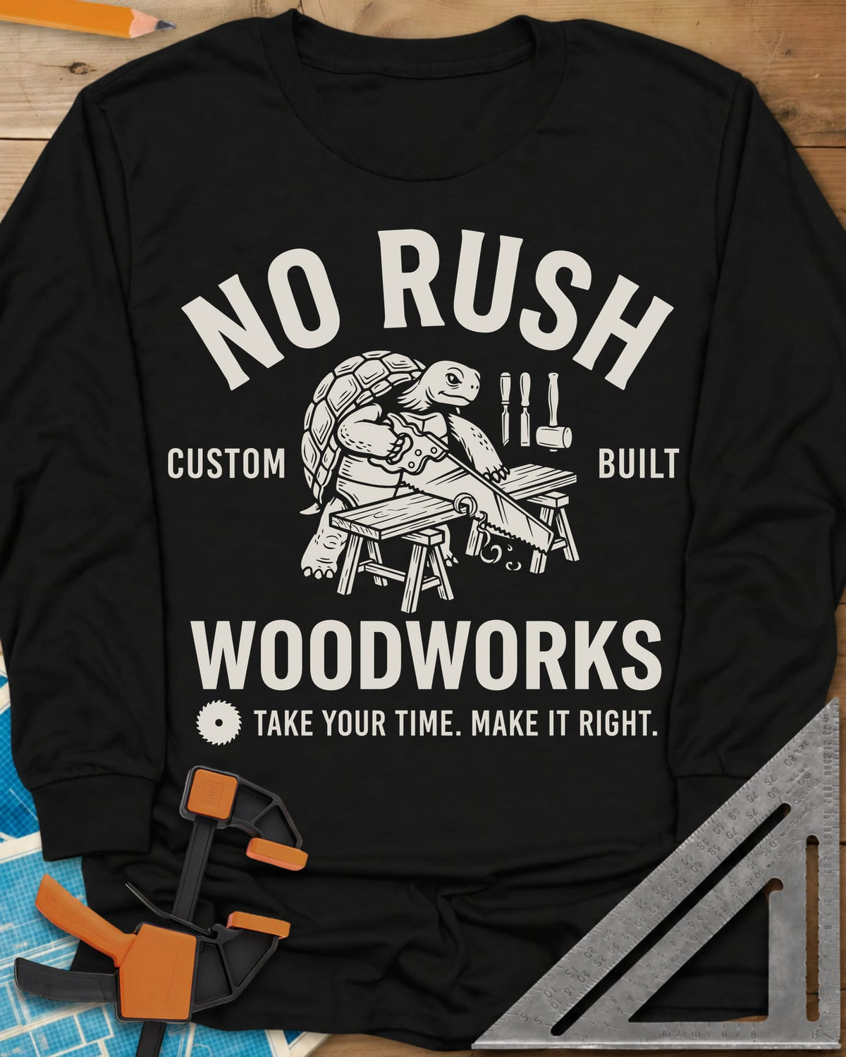 No Rush Woodworks long sleeve shirt in Black, a tortoise sawing a board on sawhorses inside a woodshop badge