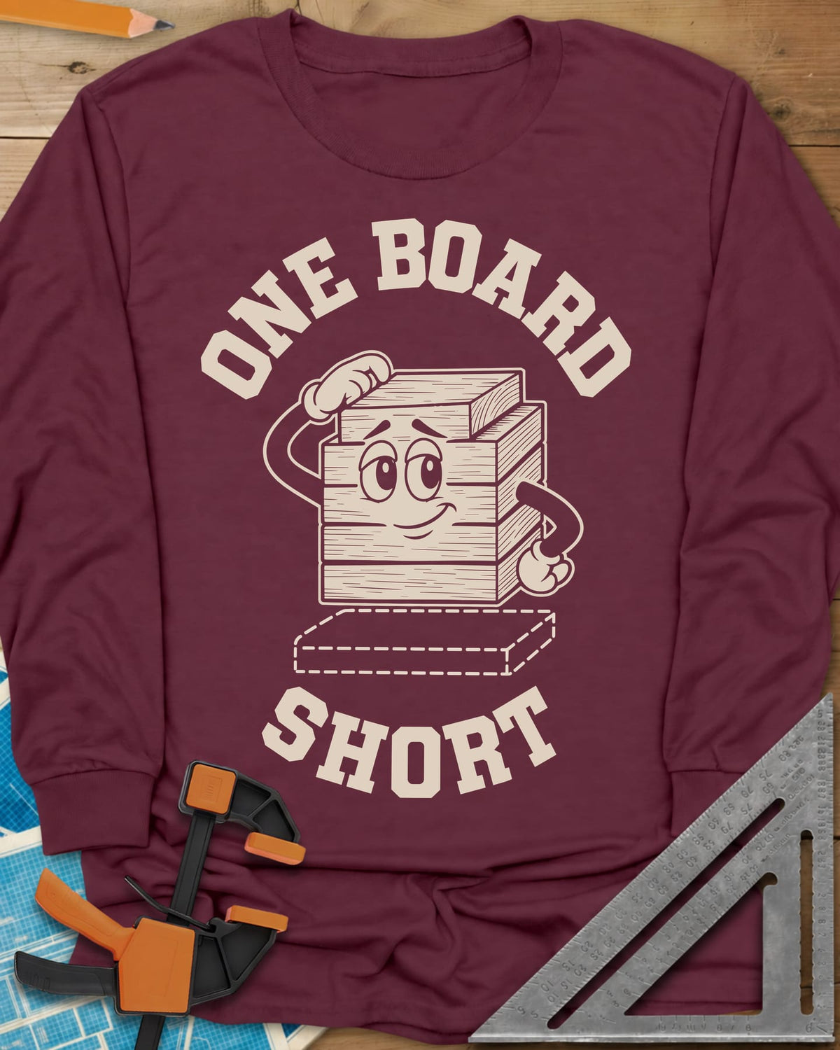 One Board Short long sleeve shirt in Maroon, a cartoon stack of boards scratching its head over a missing board